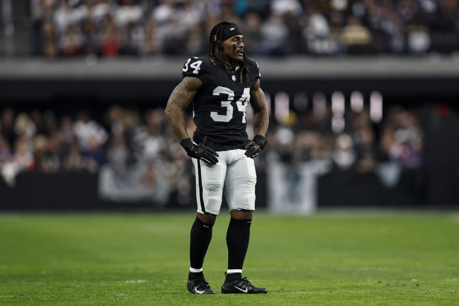 LAS VEGAS, NEVADA - DECEMBER 18: Brandon Bolden #34 of the Las Vegas Raiders looks on during an NFL football game between the Las Vegas Raiders and the New England Patriots at Allegiant Stadium on December 18, 2022 in Las Vegas, Nevada. (Photo by Michael Owens/Getty Images)