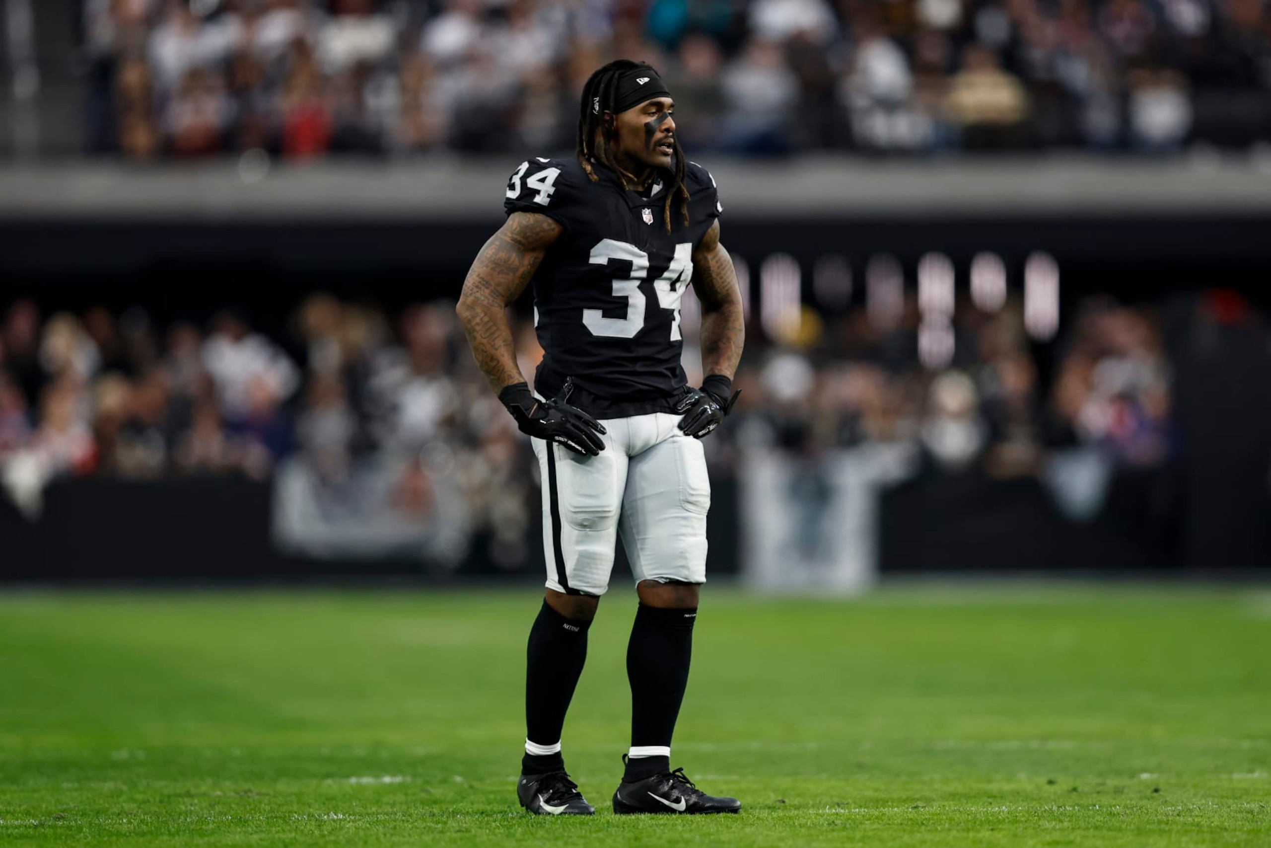LAS VEGAS, NEVADA - DECEMBER 18: Brandon Bolden #34 of the Las Vegas Raiders looks on during an NFL football game between the Las Vegas Raiders and the New England Patriots at Allegiant Stadium on December 18, 2022 in Las Vegas, Nevada. (Photo by Michael Owens/Getty Images)
