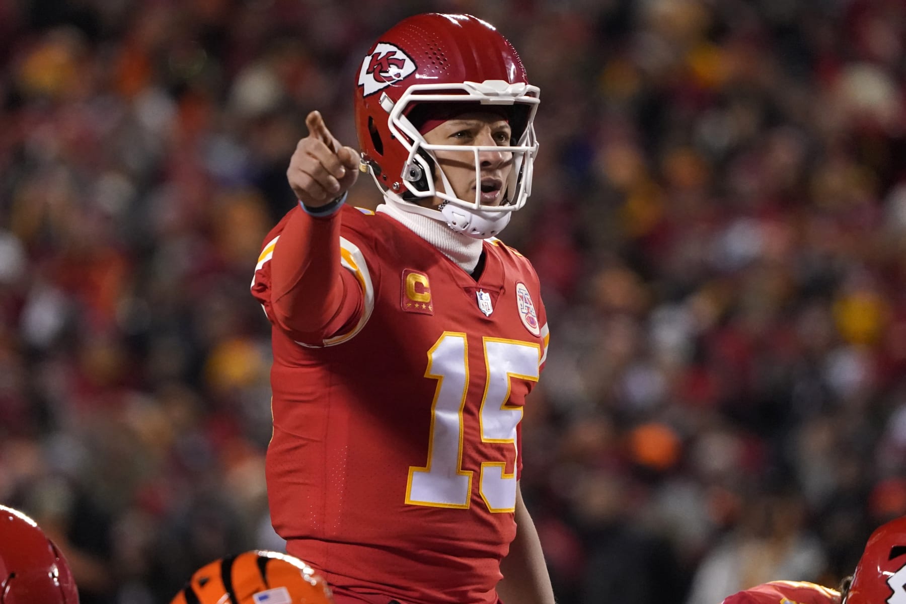 Kansas City Chiefs quarterback Patrick Mahomes signals teammates during the first half of the NFL AFC Championship playoff football game against the Cincinnati Bengals, Sunday, Jan. 29, 2023, in Kansas City, Mo. (AP Photo/Ed Zurga)