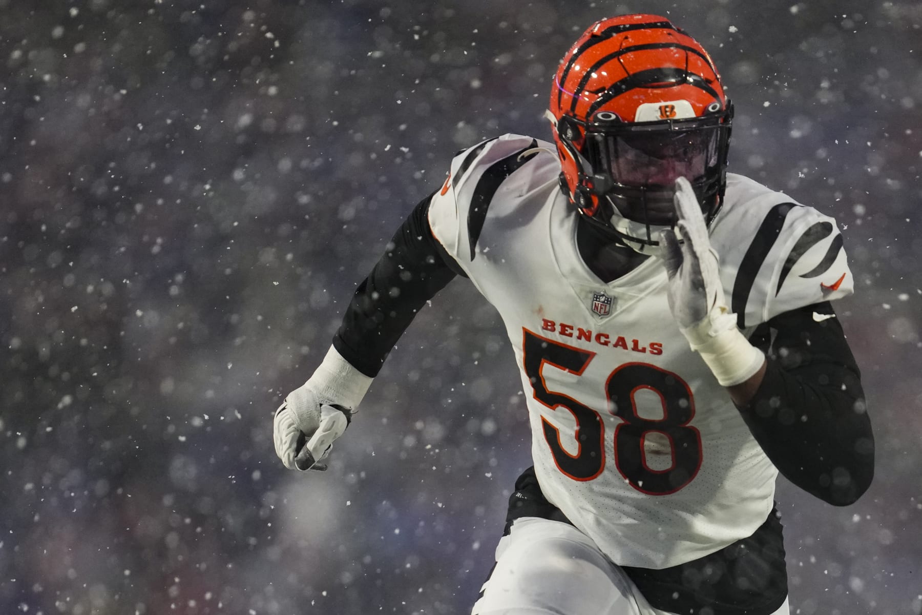 ORCHARD PARK, NY - JANUARY 22: Joseph Ossai #58 of the Cincinnati Bengals defends against the Buffalo Bills at Highmark Stadium on January 22, 2023 in Orchard Park, New York. (Photo by Cooper Neill/Getty Images)