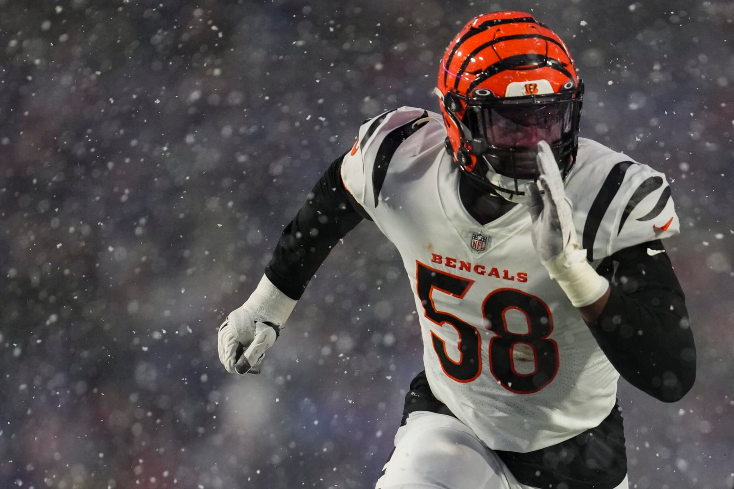 ORCHARD PARK, NY - JANUARY 22: Joseph Ossai #58 of the Cincinnati Bengals defends against the Buffalo Bills at Highmark Stadium on January 22, 2023 in Orchard Park, New York. (Photo by Cooper Neill/Getty Images)