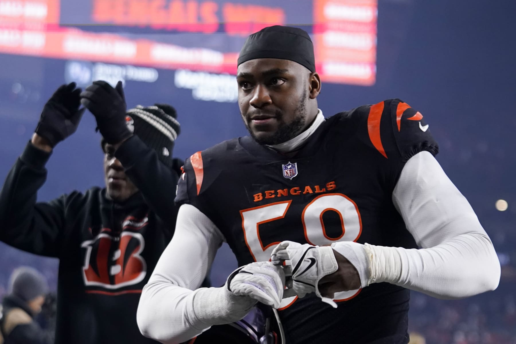Cincinnati Bengals defensive end Joseph Ossai (58) walks off the field following a wild-card playoff NFL football game against the Baltimore Ravens, Monday, Jan. 16, 2023, in Cincinnati. (AP Photo/Jeff Dean)