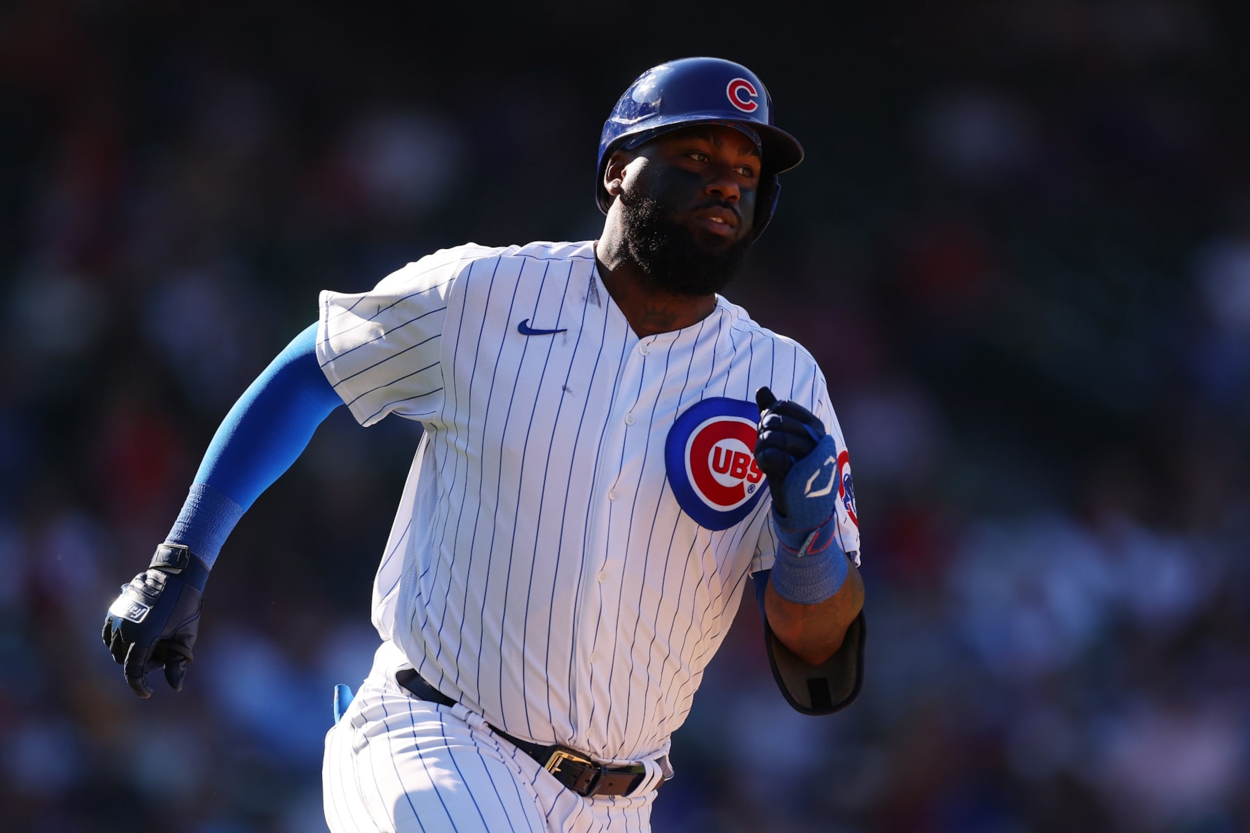 CHICAGO, ILLINOIS - SEPTEMBER 08: Franmil Reyes #32 of the Chicago Cubs runs the bases against the Cincinnati Reds at Wrigley Field on September 08, 2022 in Chicago, Illinois. (Photo by Michael Reaves/Getty Images) CHICAGO, ILLINOIS - SEPTEMBER 08: Franmil Reyes #32 of the Chicago Cubs runs the bases against the Cincinnati Reds at Wrigley Field on September 08, 2022 in Chicago, Illinois. (Photo by Michael Reaves/Getty Images)