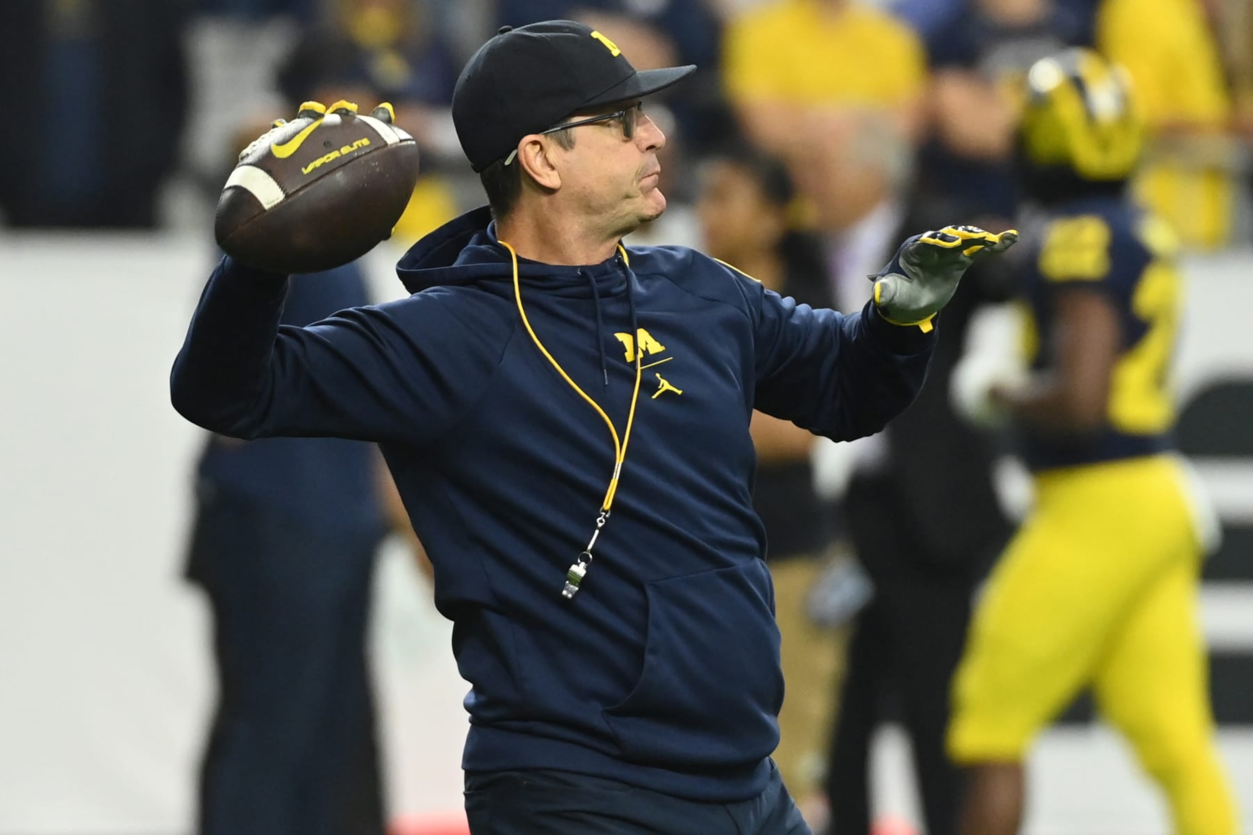 GLENDALE, ARIZONA - DECEMBER 31: Head coach Jim Harbaugh of the Michigan Wolverines is seen during warmups prior to the game against the TCU Horned Frogs in the Vrbo Fiesta Bowl at State Farm Stadium on December 31, 2022 in Glendale, Arizona. (Photo by Norm Hall/Getty Images)