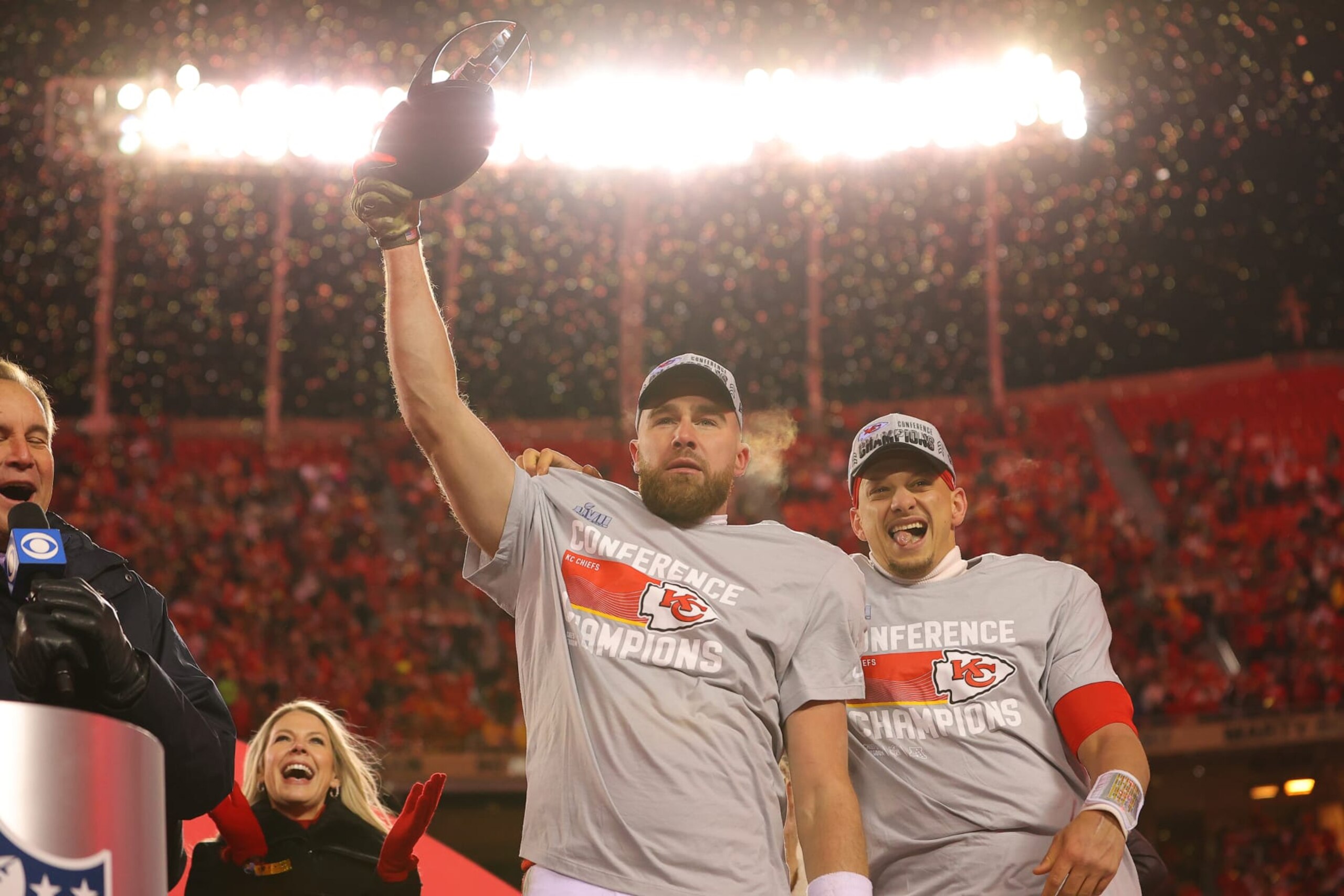 KANSAS CITY, MISSOURI - JANUARY 29: Travis Kelce #87 and Patrick Mahomes #15 of the Kansas City Chiefs celebrate with the Lamar Hunt Trophy after defeating the Cincinnati Bengals 23-20 in the AFC Championship Game at GEHA Field at Arrowhead Stadium on January 29, 2023 in Kansas City, Missouri. (Photo by Kevin C. Cox/Getty Images)