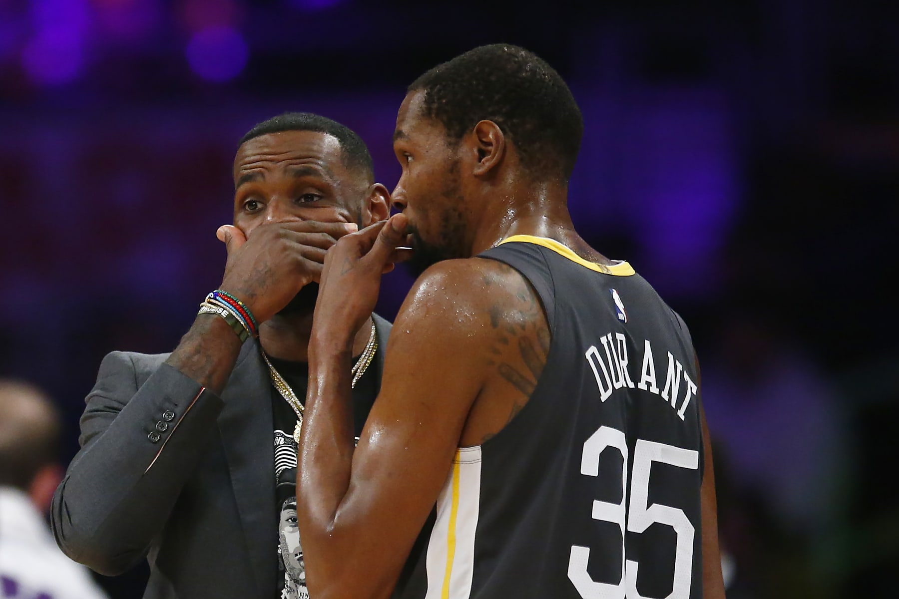 LOS ANGELES, CALIFORNIA - APRIL 04: LeBron James #23 of the Los Angeles Lakers speaks to Kevin Durant #35 of the Golden State Warriors during a timeout in the first half at Staples Center on April 04, 2019 in Los Angeles, California. NOTE TO USER: User expressly acknowledges and agrees that, by downloading and or using this photograph, User is consenting to the terms and conditions of the Getty Images License Agreement. (Photo by Yong Teck Lim/Getty Images)