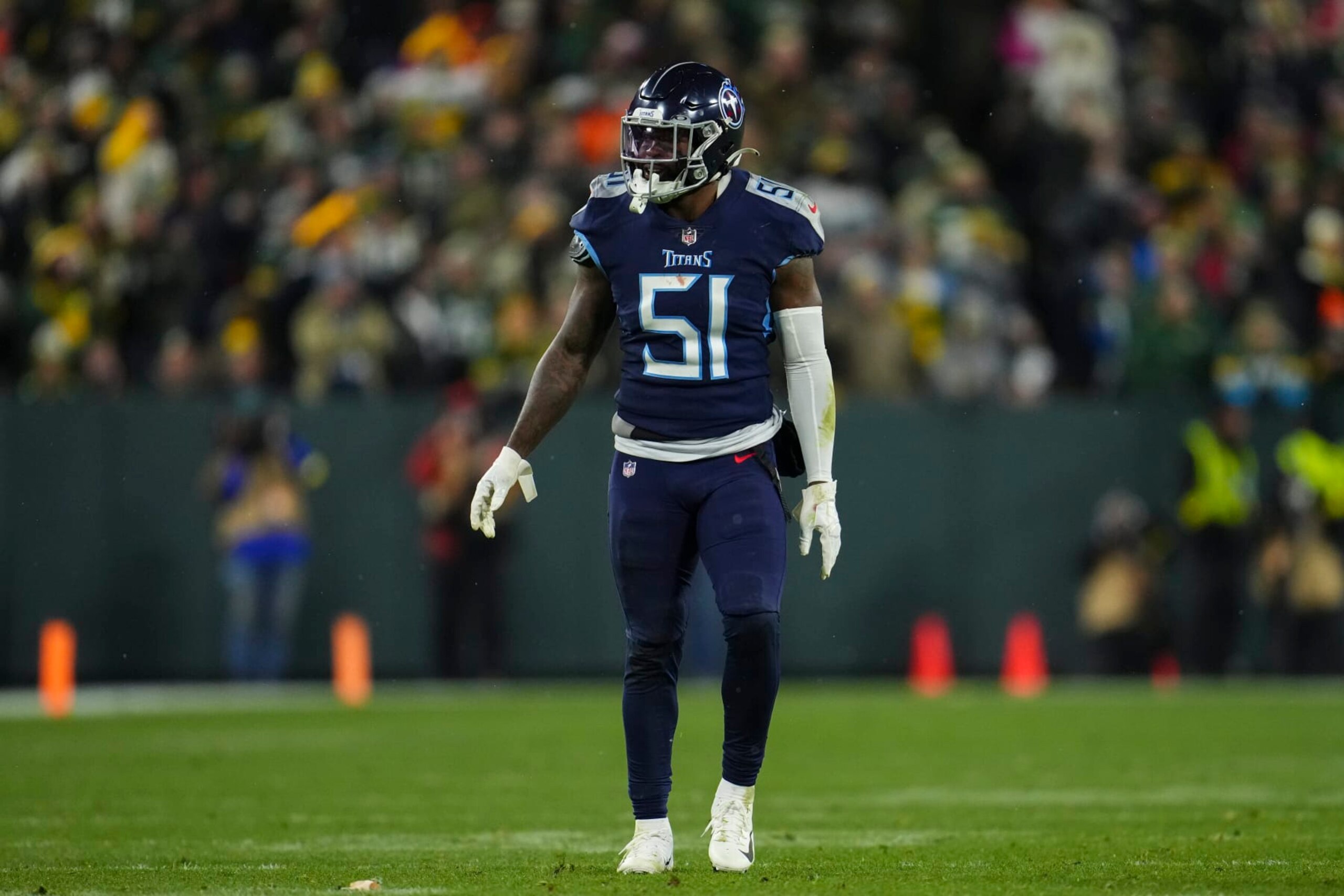 GREEN BAY, WI - NOVEMBER 17: David Long Jr. #51 of the Tennessee Titans defends against the Green Bay Packers at Lambeau on November 17, 2022 in Green Bay, Wisconsin. (Photo by Cooper Neill/Getty Images)