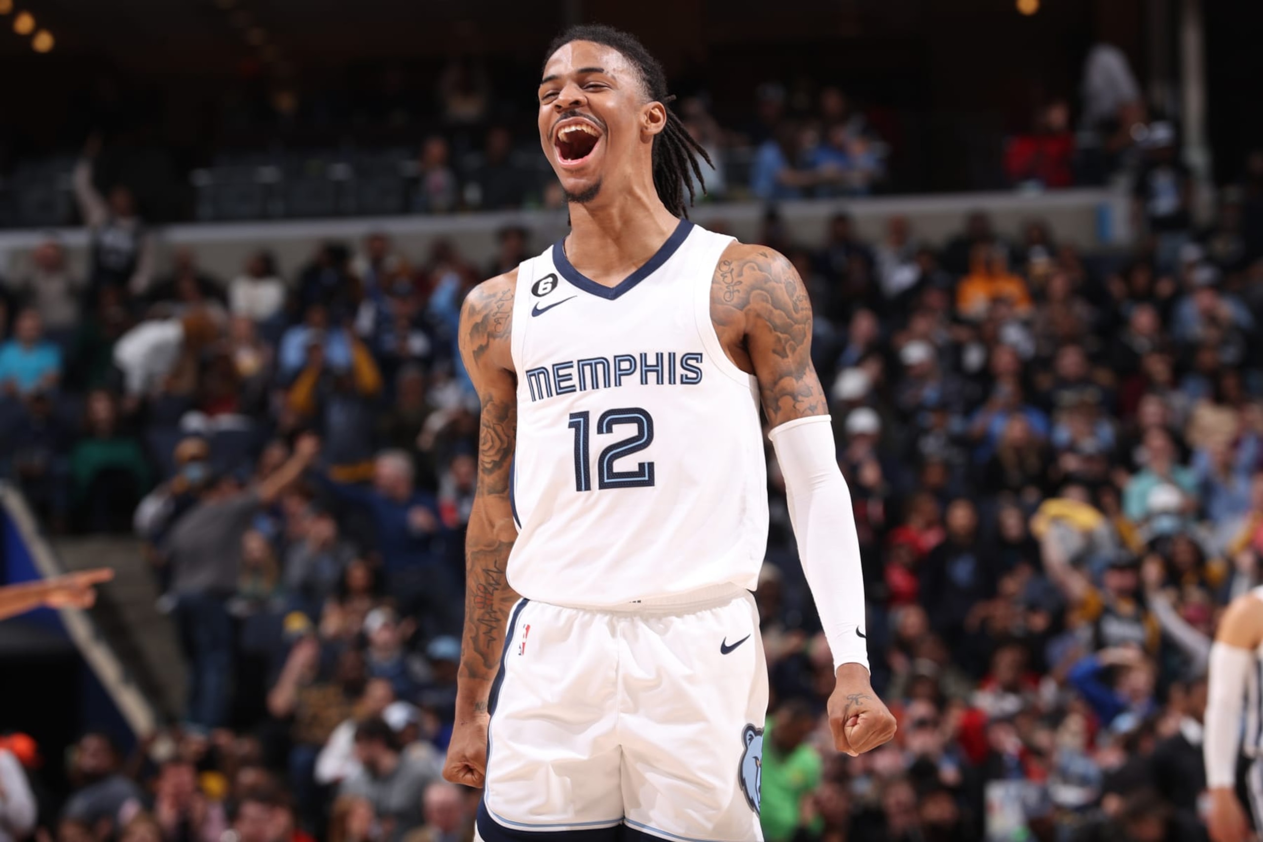 MEMPHIS, TN - JANUARY 29: Ja Morant #12 of the Memphis Grizzlies celebrates during the game against the Indiana Pacers on January 29, 2023 at FedExForum in Memphis, Tennessee. NOTE TO USER: User expressly acknowledges and agrees that, by downloading and or using this photograph, User is consenting to the terms and conditions of the Getty Images License Agreement. Mandatory Copyright Notice: Copyright 2023 NBAE (Photo by Joe Murphy/NBAE via Getty Images)