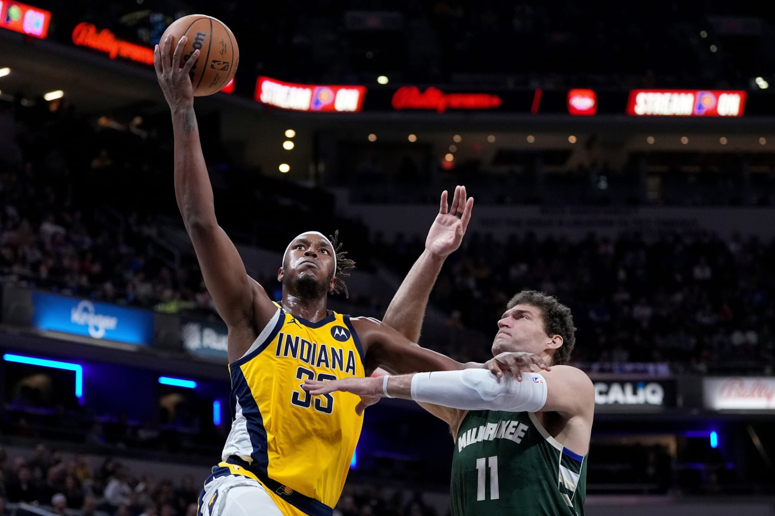 INDIANAPOLIS, INDIANA - JANUARY 27: Myles Turner #33 of the Indiana Pacers attempts a shot while being guarded by Brook Lopez #11 of the Milwaukee Bucks in the third quarter at Gainbridge Fieldhouse on January 27, 2023 in Indianapolis, Indiana. NOTE TO USER: User expressly acknowledges and agrees that, by downloading and or using this photograph, User is consenting to the terms and conditions of the Getty Images License Agreement. (Photo by Dylan Buell/Getty Images) INDIANAPOLIS, INDIANA - JANUARY 27: Myles Turner #33 of the Indiana Pacers attempts a shot while being guarded by Brook Lopez #11 of the Milwaukee Bucks in the third quarter at Gainbridge Fieldhouse on January 27, 2023 in Indianapolis, Indiana. NOTE TO USER: User expressly acknowledges and agrees that, by downloading and or using this photograph, User is consenting to the terms and conditions of the Getty Images License Agreement. (Photo by Dylan Buell/Getty Images)