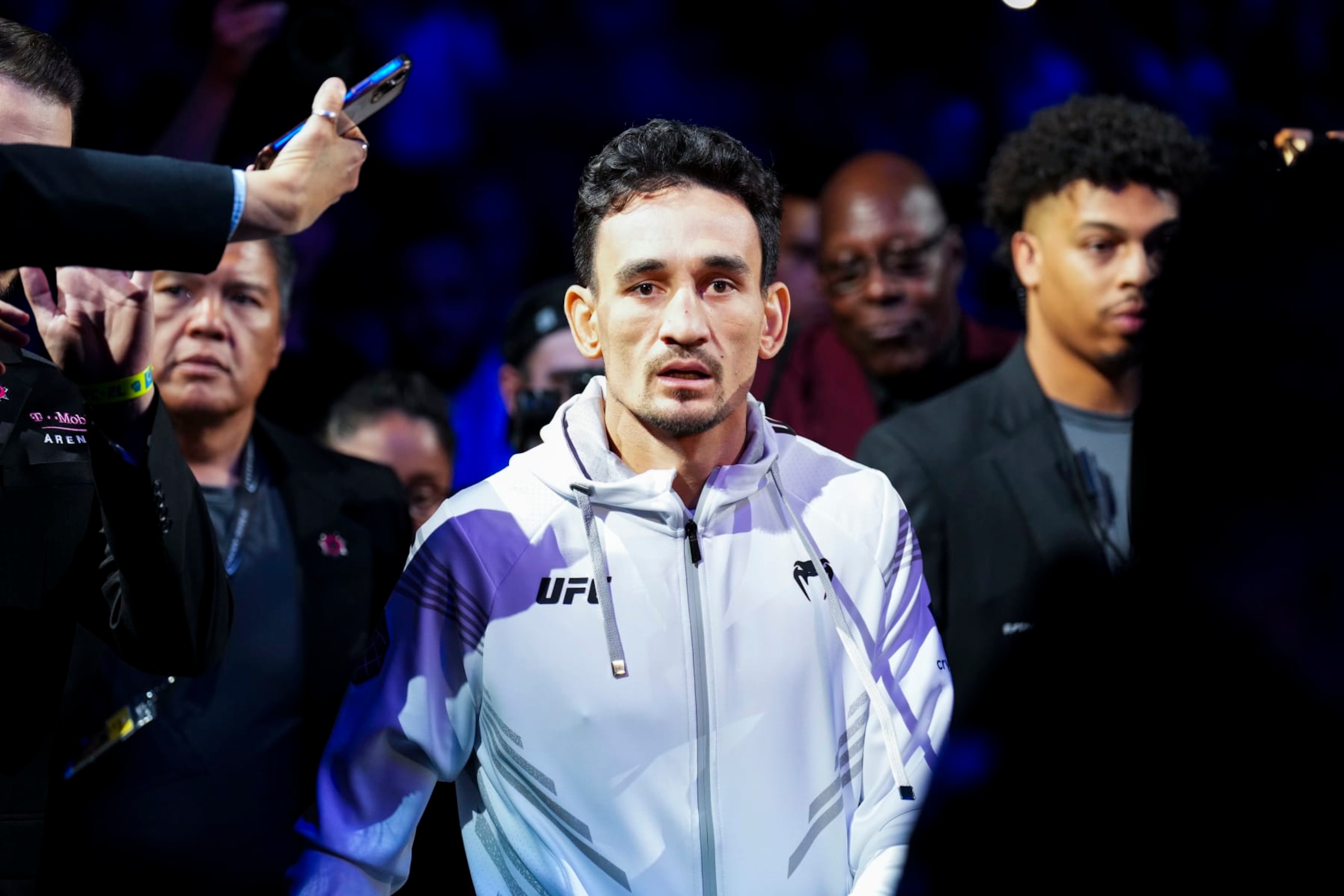 LAS VEGAS, NEVADA - JULY 02: Max Holloway walks to the Octagon in the UFC featherweight championship fight during the UFC 276 event at T-Mobile Arena on July 02, 2022 in Las Vegas, Nevada. (Photo by Chris Unger/Zuffa LLC)