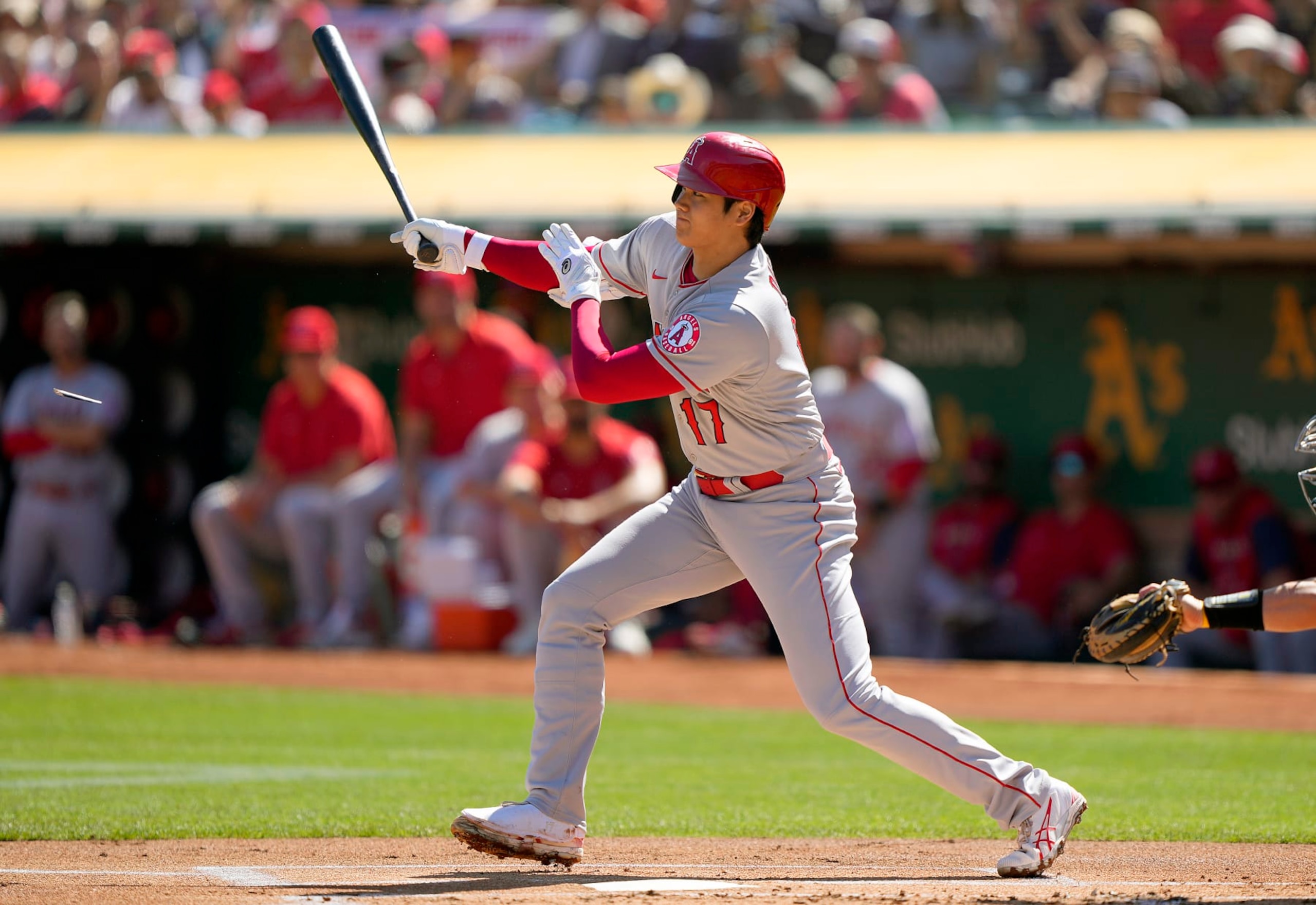 OAKLAND, CALIFORNIA - OCTOBER 05: Shohei Ohtani #17 of the Los Angeles Angels hits a single against the Oakland Athletics in the top of the first inning at RingCentral Coliseum on October 05, 2022 in Oakland, California. (Photo by Thearon W. Henderson/Getty Images)