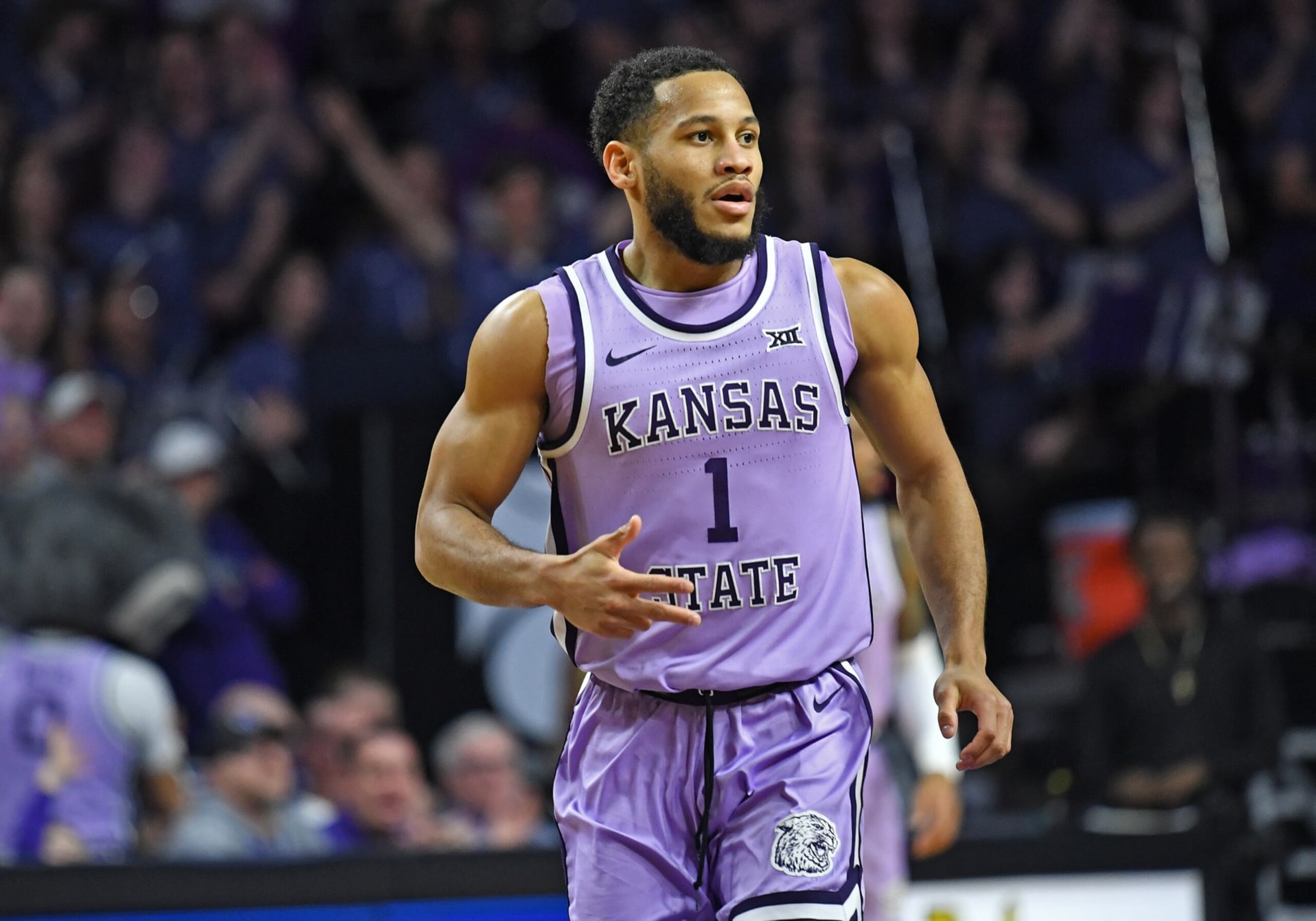 MANHATTAN, KS - JANUARY 28:  Markquis Nowell #1 of the Kansas State Wildcats reacts after hitting a three point shot in the first half against the Florida Gators at Bramlage Coliseum on January 28, 2023 in Manhattan, Kansas.  (Photo by Peter G. Aiken/Getty Images)