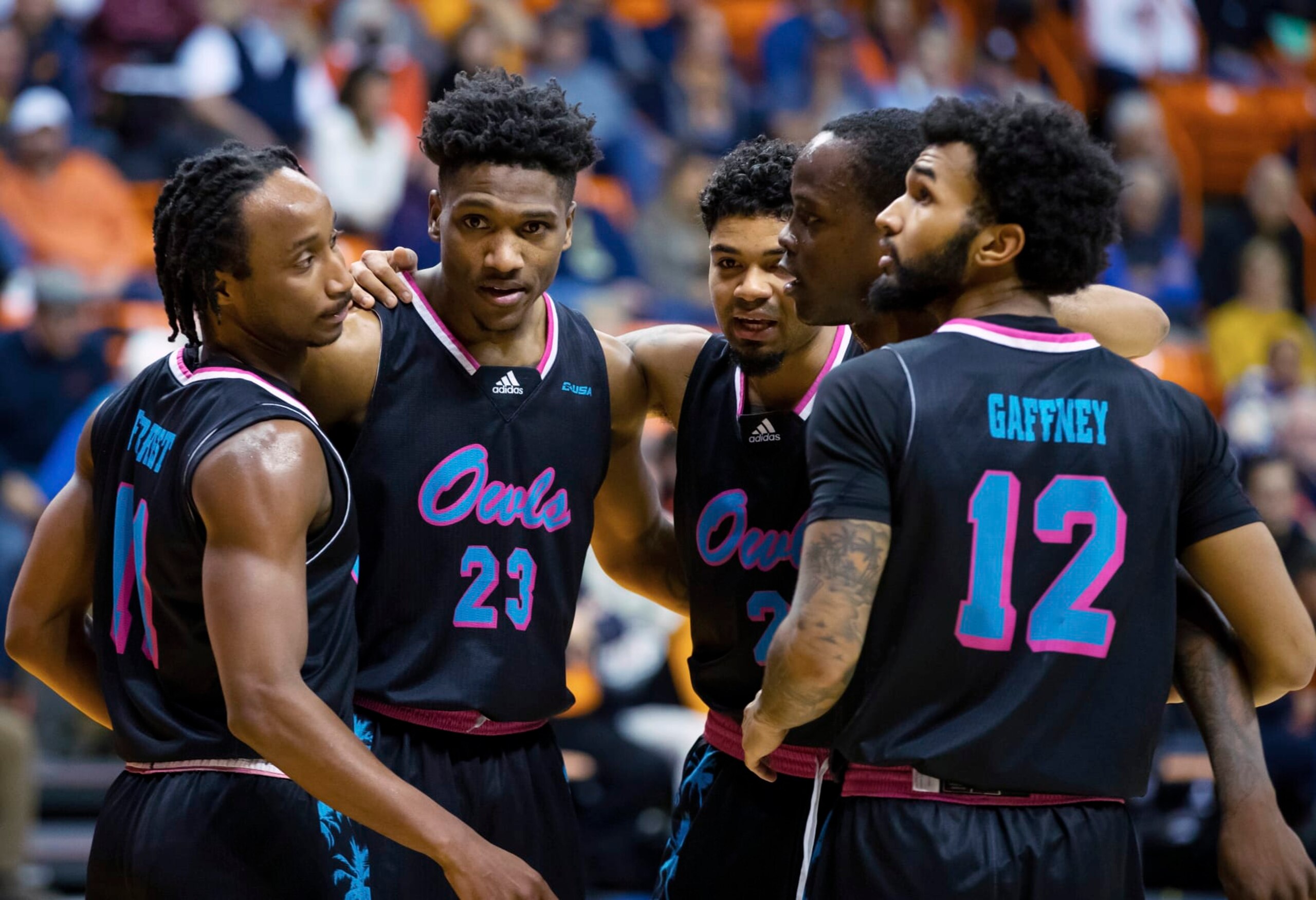 Florida Atlantic's Michael Forrest, Brandon Weatherspoon, Nick Boyd, Johnell Davis and Jalen Gaffney, from left, celebrate at the end of the first half of the team's NCAA college basketball game against UTEP, Saturday, Jan. 21, 2023, in El Paso, Texas. (AP Photo/Andrés Leighton)