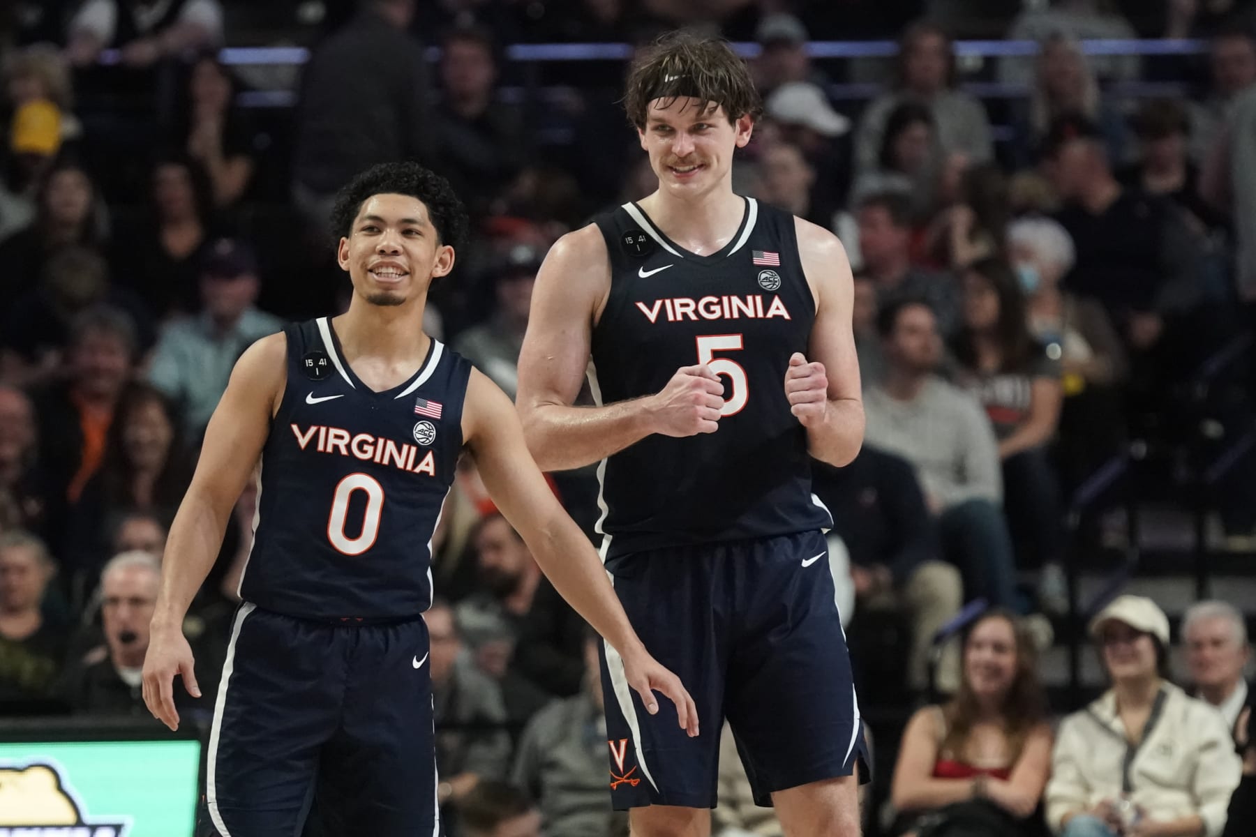 Kihei Clark (0) and Ben Vander Plas (5)