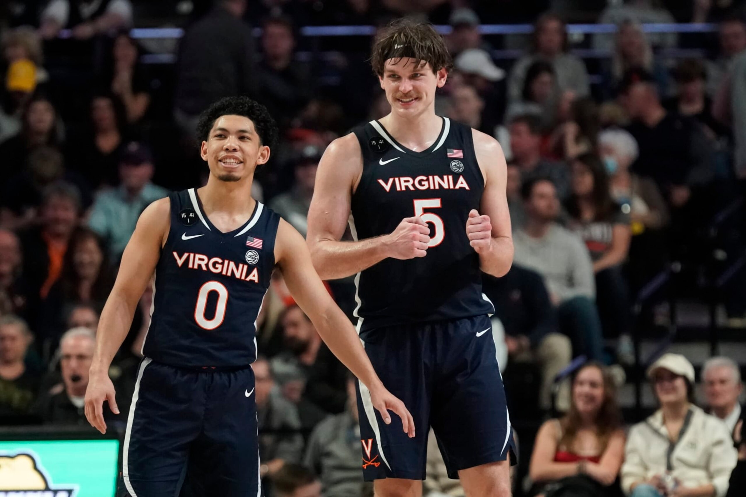 Kihei Clark (0) and Ben Vander Plas (5)