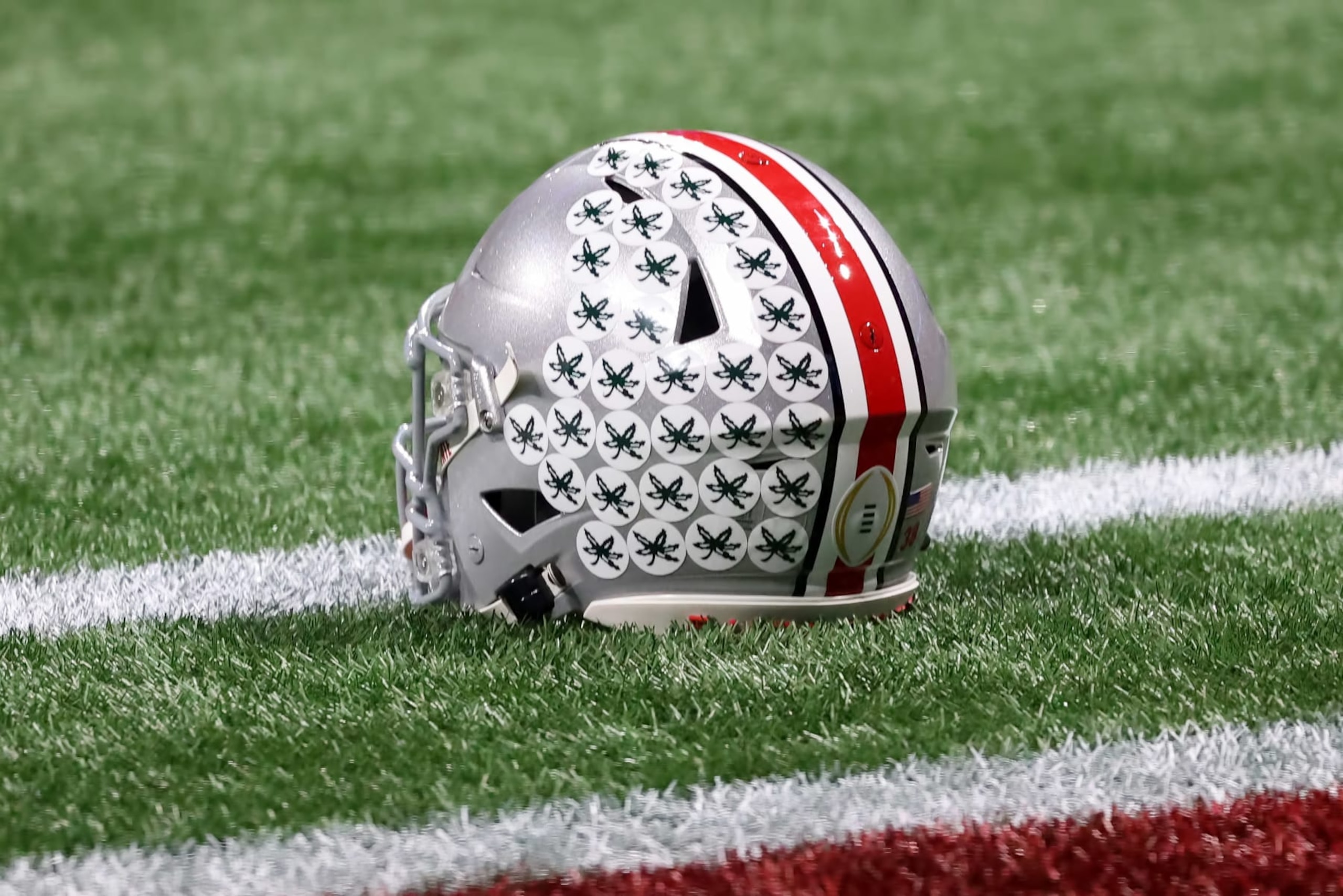 ATLANTA, GA - DECEMBER 31: A general view of an Ohio State Buckeyes helmet during the college football Playoff Semifinal game at the Chick-fil-a Peach Bowl between the Georgia Bulldogs and the Ohio State Buckeyes on December 31, 2022 at Mercedes-Benz Stadium in Atlanta, Georgia. (Photo by Michael Wade/Icon Sportswire via Getty Images) ATLANTA, GA - DECEMBER 31: A general view of an Ohio State Buckeyes helmet during the college football Playoff Semifinal game at the Chick-fil-a Peach Bowl between the Georgia Bulldogs and the Ohio State Buckeyes on December 31, 2022 at Mercedes-Benz Stadium in Atlanta, Georgia. (Photo by Michael Wade/Icon Sportswire via Getty Images)