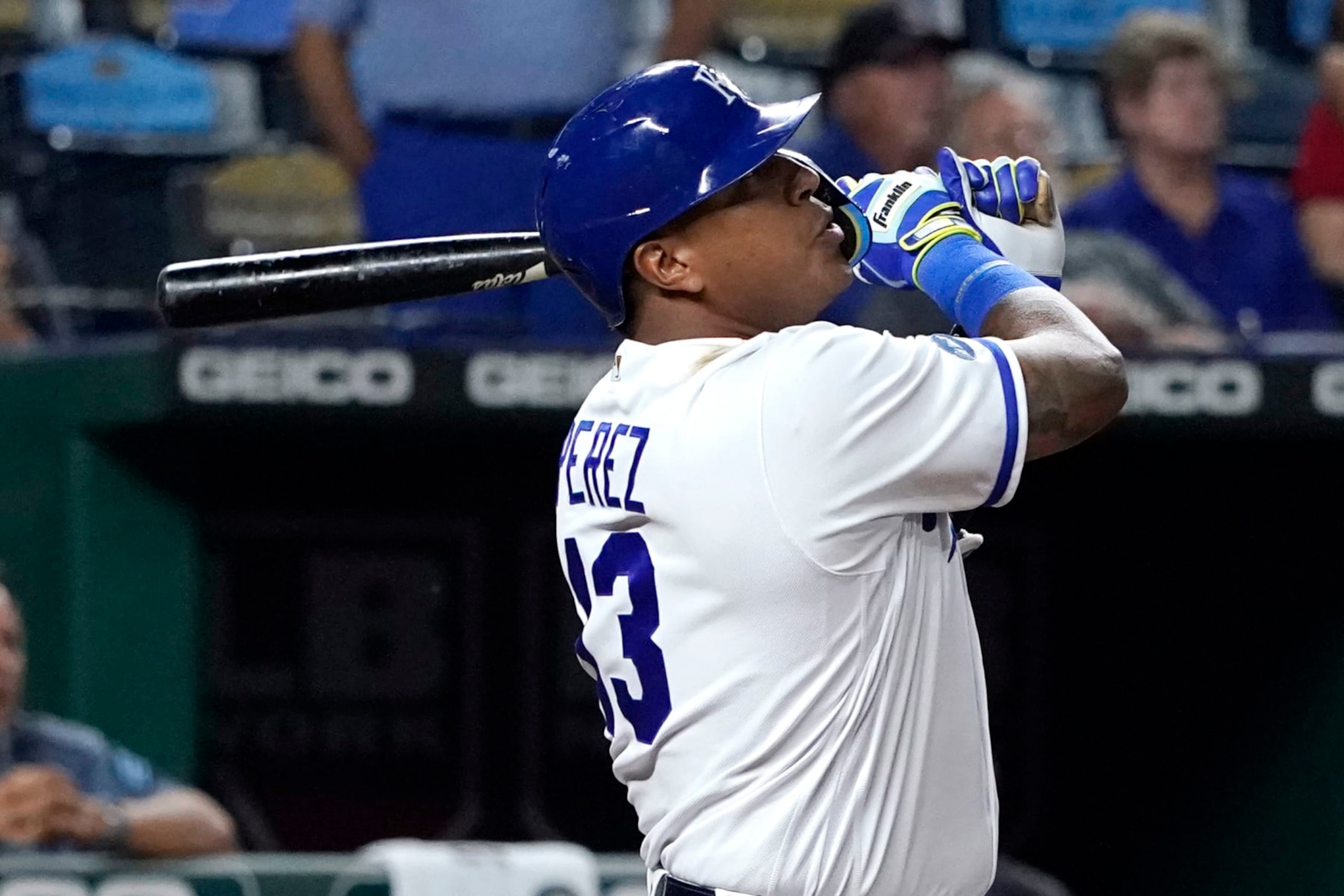 KANSAS CITY, MISSOURI - SEPTEMBER 07:  Salvador Perez #13 of the Kansas City Royals hits a walk-off sacrifice fly in the ninth inning against the Cleveland Guardians at Kauffman Stadium on September 07, 2022 in Kansas City, Missouri. The Royals won 2-1. (Photo by Ed Zurga/Getty Images)