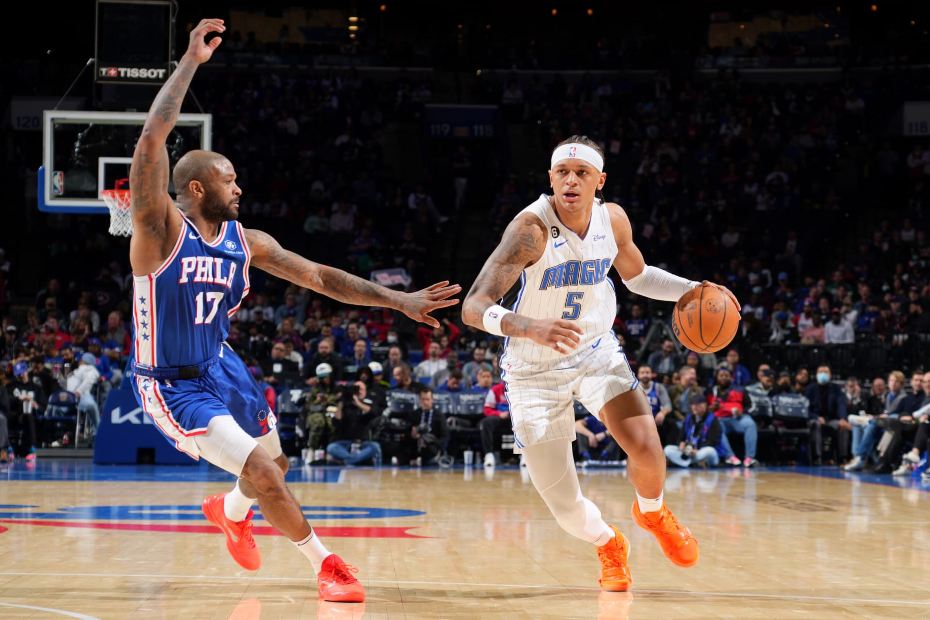 PHILADELPHIA, PA - JANUARY 30: Paolo Banchero #5 of the Orlando Magic dribbles the ball during the game against the Philadelphia 76ers on January 30, 2023 at the Wells Fargo Center in Philadelphia, Pennsylvania NOTE TO USER: User expressly acknowledges and agrees that, by downloading and/or using this Photograph, user is consenting to the terms and conditions of the Getty Images License Agreement. Mandatory Copyright Notice: Copyright 2023 NBAE (Photo by Jesse D. Garrabrant/NBAE via Getty Images) PHILADELPHIA, PA - JANUARY 30: Paolo Banchero #5 of the Orlando Magic dribbles the ball during the game against the Philadelphia 76ers on January 30, 2023 at the Wells Fargo Center in Philadelphia, Pennsylvania NOTE TO USER: User expressly acknowledges and agrees that, by downloading and/or using this Photograph, user is consenting to the terms and conditions of the Getty Images License Agreement. Mandatory Copyright Notice: Copyright 2023 NBAE (Photo by Jesse D. Garrabrant/NBAE via Getty Images)