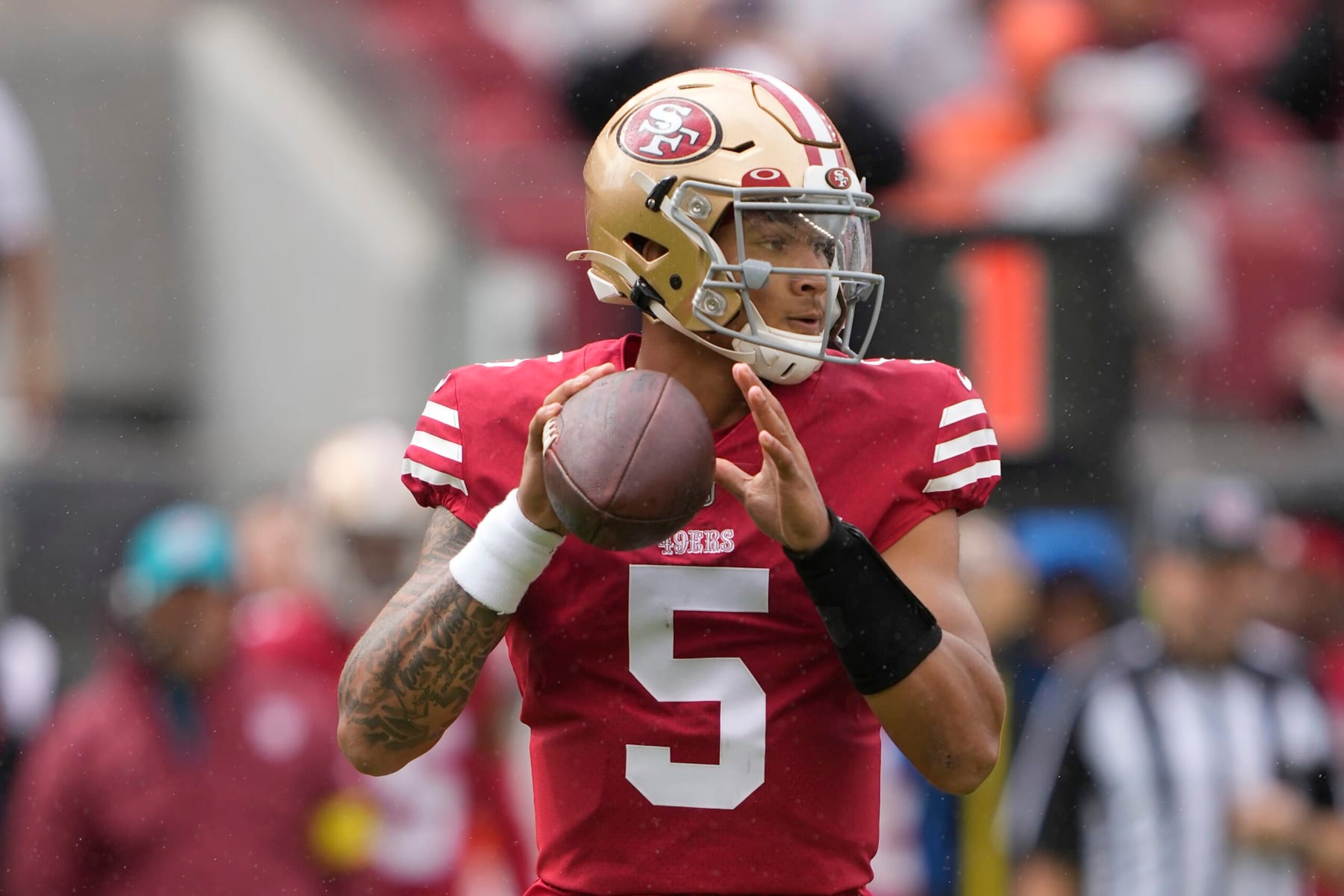 SANTA CLARA, CALIFORNIA - SEPTEMBER 18: Trey Lance #5 of the San Francisco 49ers looks to pass the ball against the Seattle Seahawks during the first quarter at Levi's Stadium on September 18, 2022 in Santa Clara, California. (Photo by Thearon W. Henderson/Getty Images)