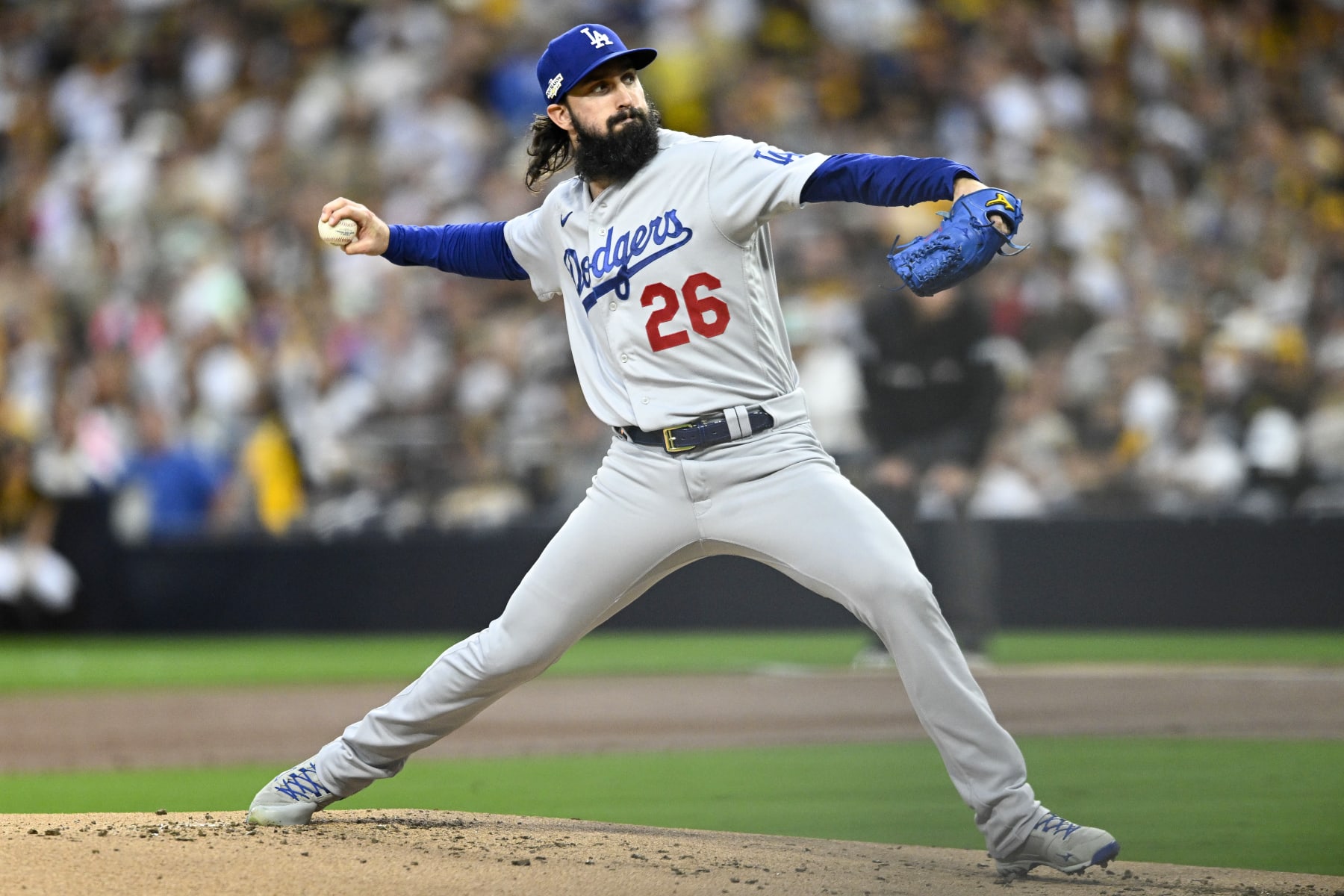 SAN DIEGO, CALIFORNIA - OCTOBER 14: Tony Gonsolin #26 of the Los Angeles Dodgers delivers a pitch against the San Diego Padres during the first inning in game three of the National League Division Series at PETCO Park on October 14, 2022 in San Diego, California. (Photo by Denis Poroy/Getty Images)