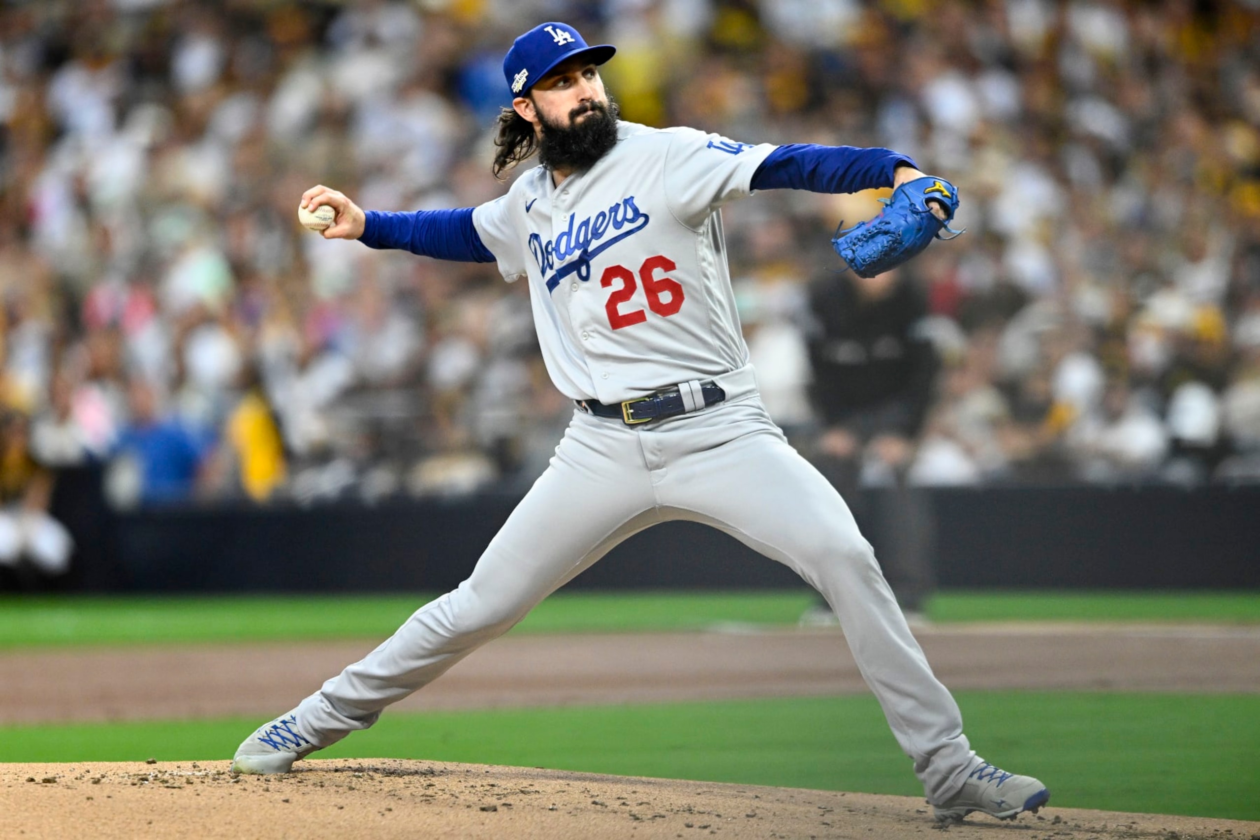 SAN DIEGO, CALIFORNIA - OCTOBER 14: Tony Gonsolin #26 of the Los Angeles Dodgers delivers a pitch against the San Diego Padres during the first inning in game three of the National League Division Series at PETCO Park on October 14, 2022 in San Diego, California. (Photo by Denis Poroy/Getty Images)