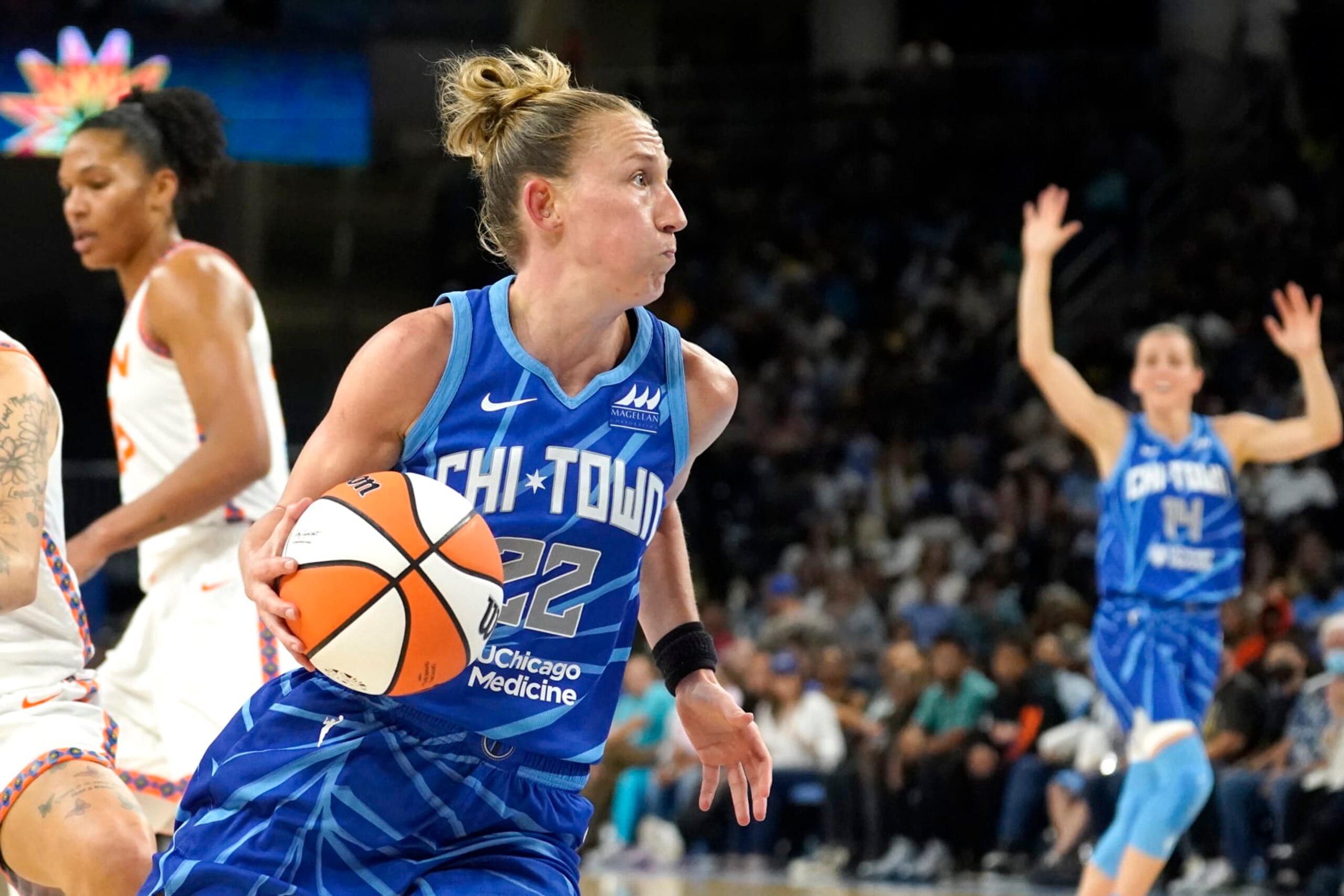Chicago Sky's Courtney Vandersloot drives to the basket during the second half of Game 5 in a WNBA basketball playoff semifinal against the Connecticut Sun Friday, Sept. 9, 2022, in Chicago. The Sun won 72-63. (AP Photo/Charles Rex Arbogast)