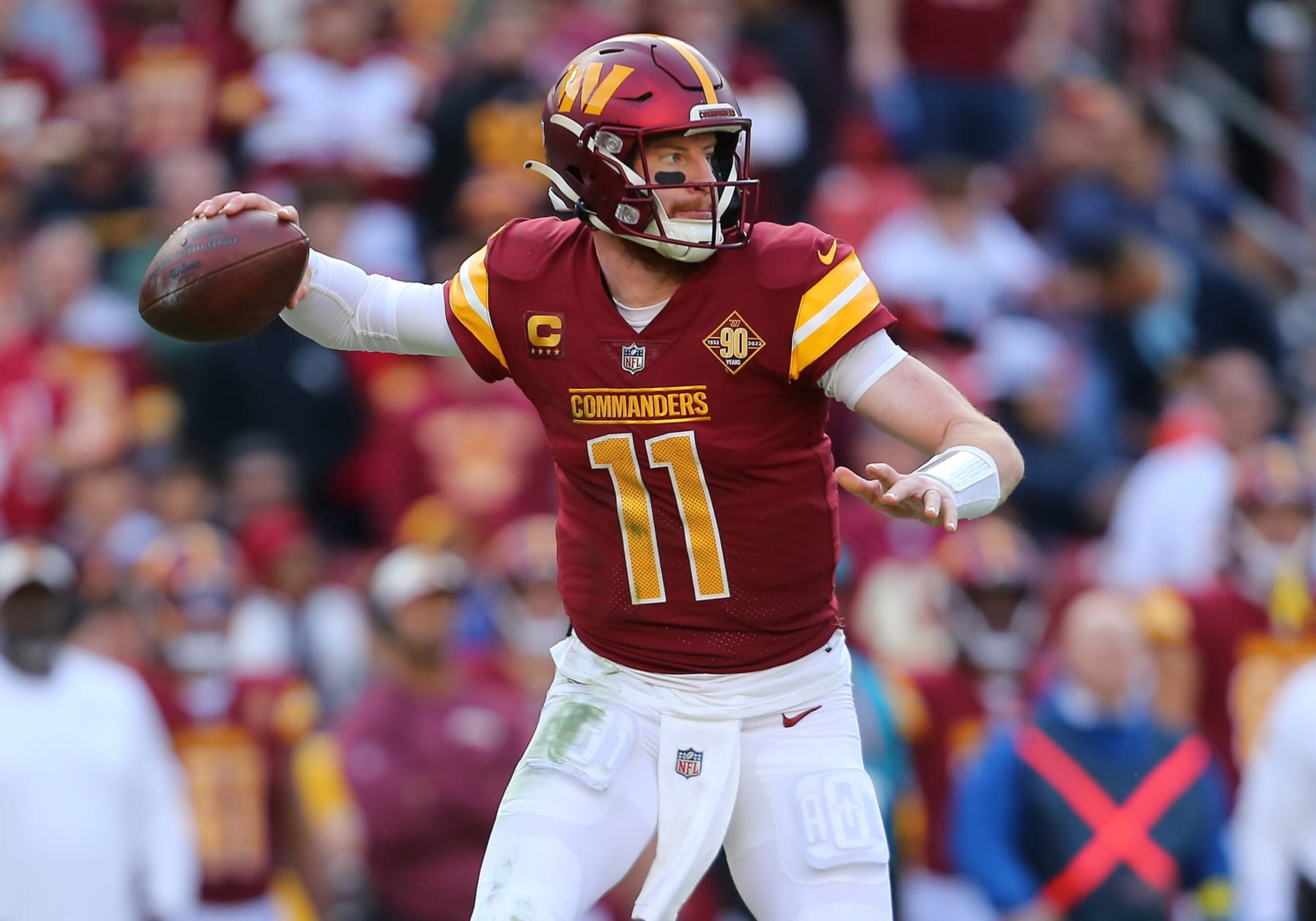 LANDOVER, MD - JANUARY 01: Washington Commanders quarterback Carson Wentz (11) throws a pass from the pocket during the Cleveland Browns game versus the Washington Commanders on January 01, 2023, at FedEx Field in Landover, MD. (Photo by Lee Coleman/Icon Sportswire via Getty Images)