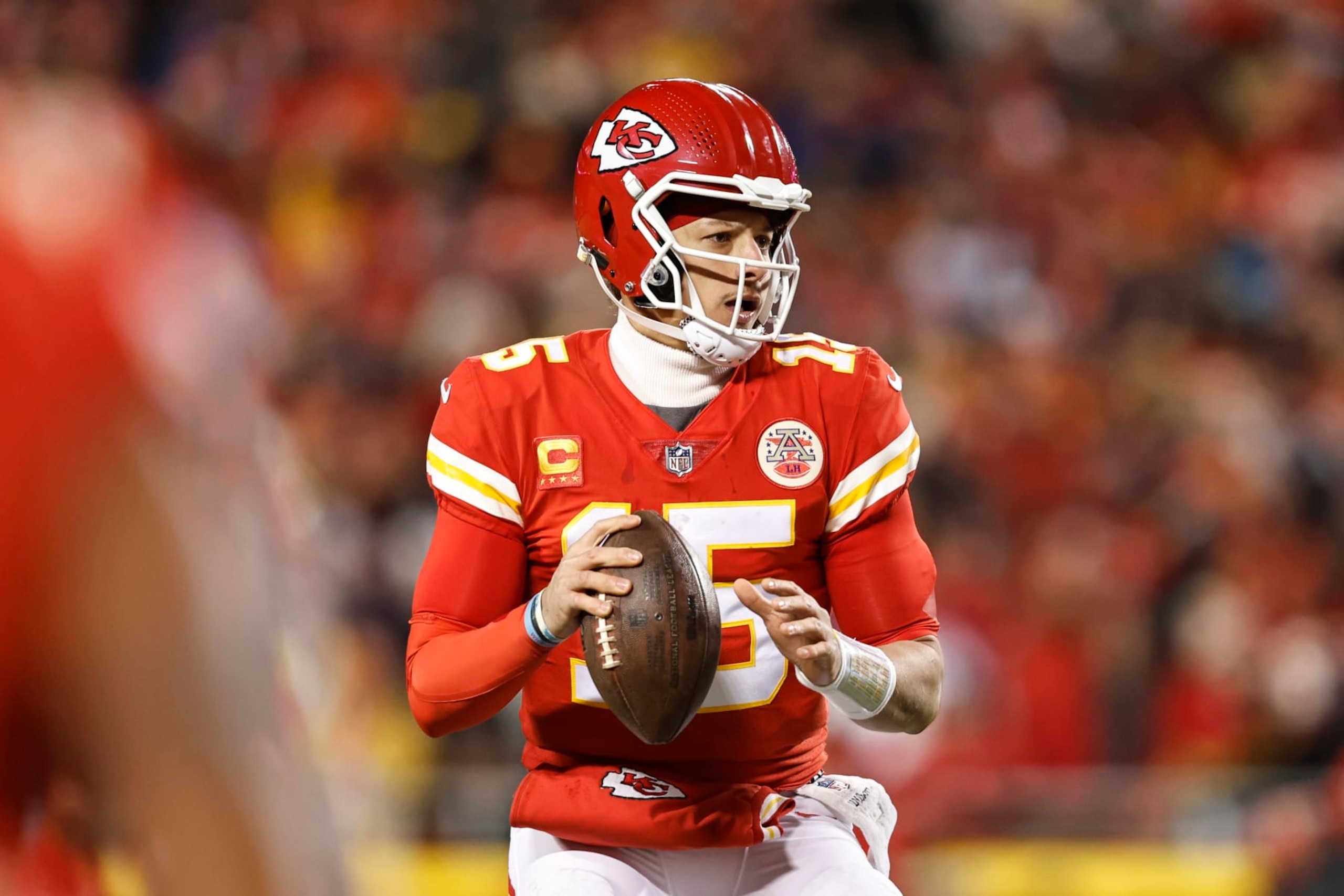 KANSAS CITY, MISSOURI - JANUARY 29: Patrick Mahomes #15 of the Kansas City Chiefs drops back to pass during the AFC Championship NFL football game between the Kansas City Chiefs and the Cincinnati Bengals at GEHA Field at Arrowhead Stadium on January 29, 2023 in Kansas City, Missouri. (Photo by Michael Owens/Getty Images)