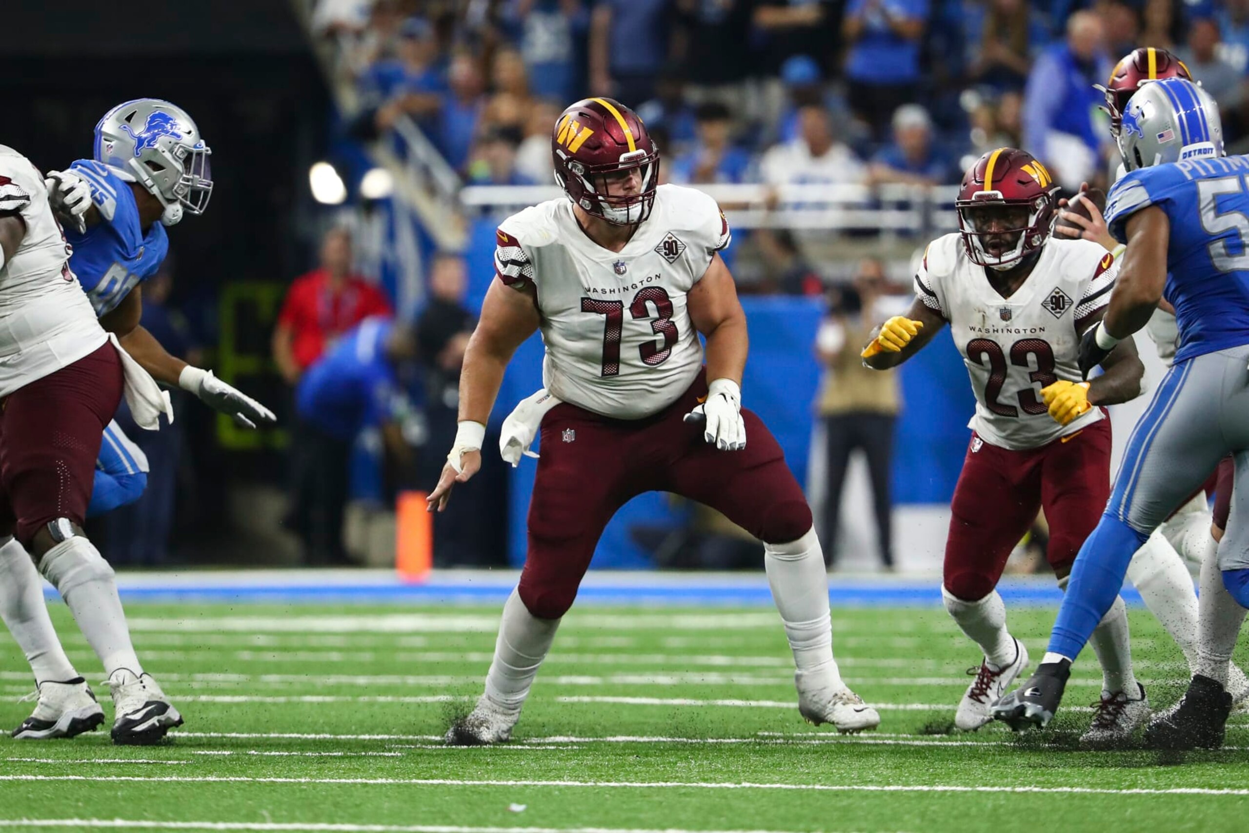 DETROIT, MI - SEPTEMBER 18: Chase Roullier #73 of the Washington Commanders blocks during an NFL football game against the Detroit Lions at Ford Field on September 18, 2022 in Detroit, Michigan. (Photo by Kevin Sabitus/Getty Images)