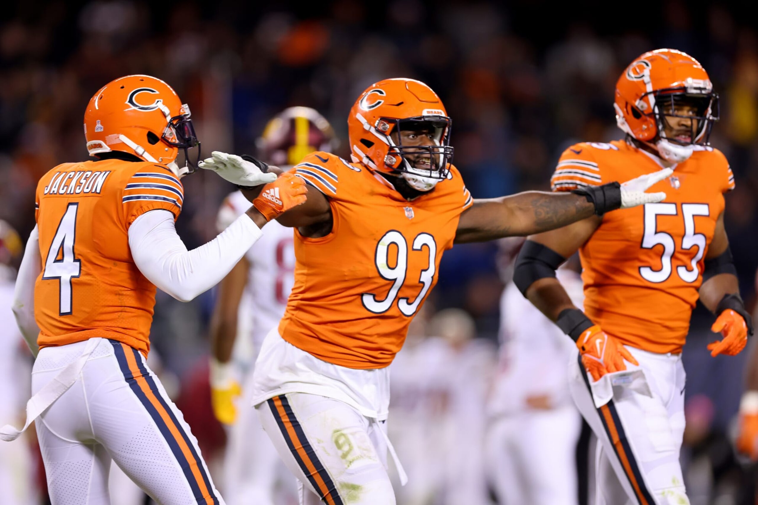 CHICAGO, ILLINOIS - OCTOBER 13: Justin Jones #93 of the Chicago Bears celebrates a missed field goal by Washington Commanders during the fourth quarter at Soldier Field on October 13, 2022 in Chicago, Illinois. (Photo by Michael Reaves/Getty Images)