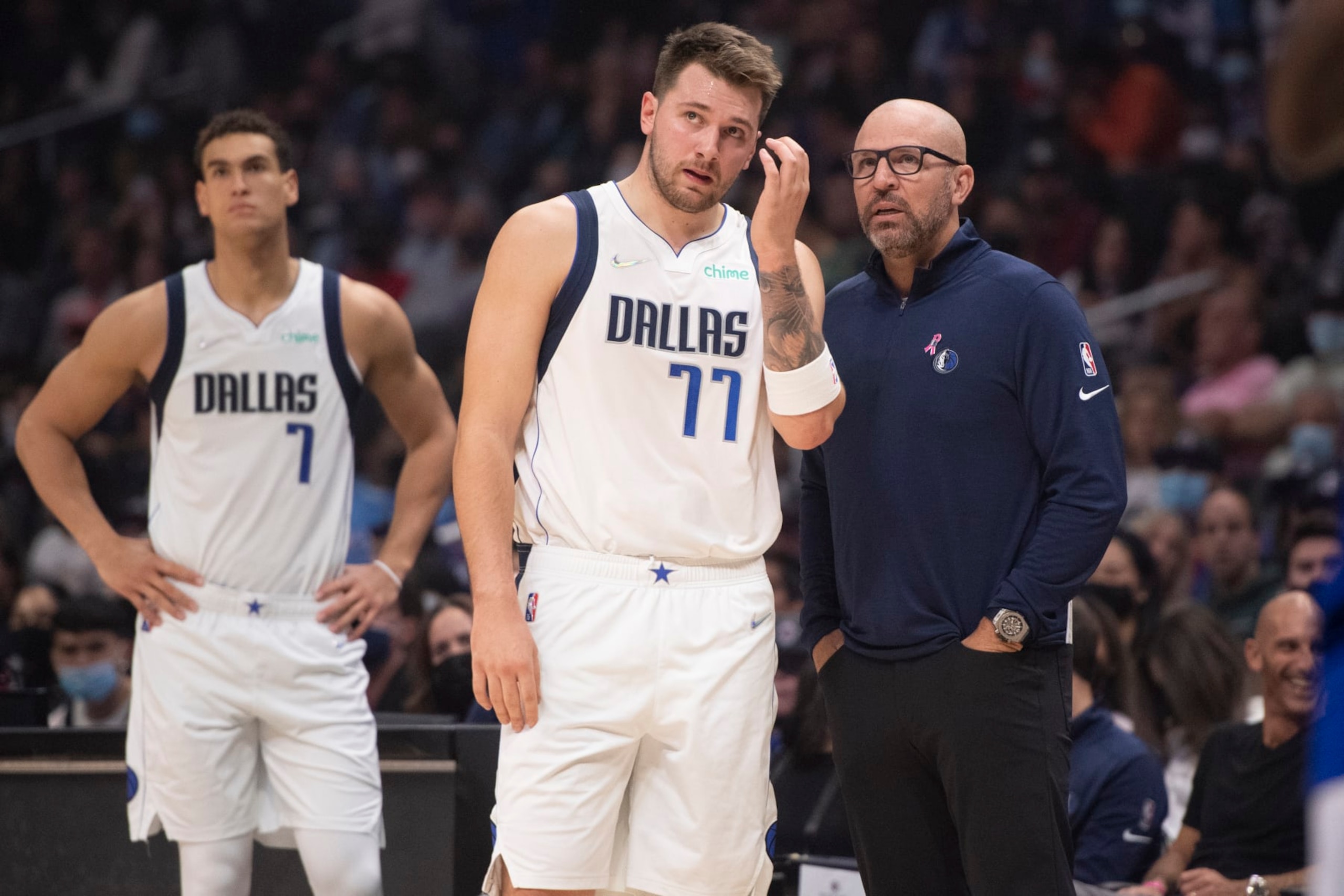 Dallas Mavericks guard Luka Doncic (77) talks to head coach Jason Kidd while playing the Los Angeles Clippers in an NBA basketball game, Tuesday, Nov. 23, 2021, in Los Angeles. (AP Photo/John McCoy)