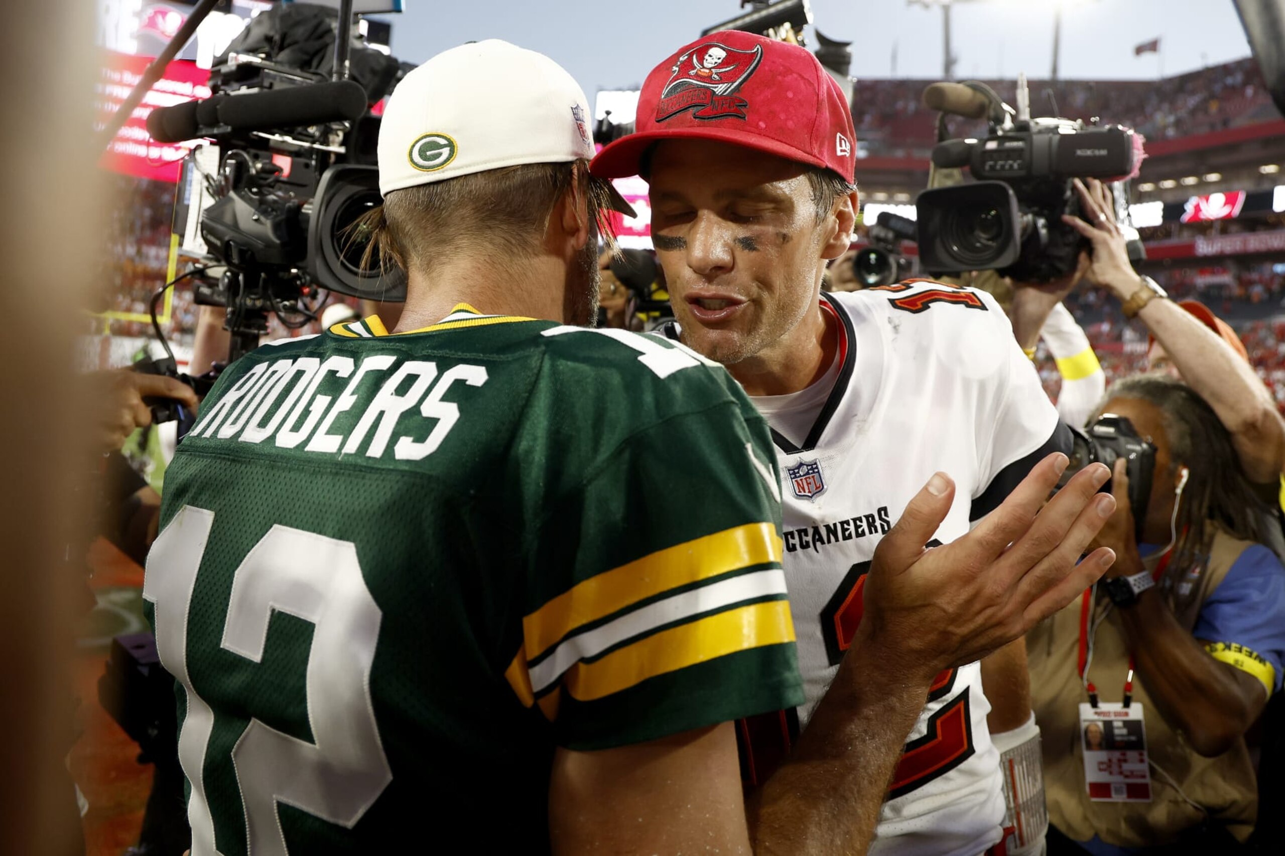 TAMPA, FLORIDA - SEPTEMBER 25: Aaron Rodgers #12 of the Green Bay Packers talks with Tom Brady #12 of the Tampa Bay Buccaneers after the game at Raymond James Stadium on September 25, 2022 in Tampa, Florida. The Packers defeated the Buccaneers with a score of 14 to 12. (Photo by Douglas P. DeFelice/Getty Images) TAMPA, FLORIDA - SEPTEMBER 25: Aaron Rodgers #12 of the Green Bay Packers talks with Tom Brady #12 of the Tampa Bay Buccaneers after the game at Raymond James Stadium on September 25, 2022 in Tampa, Florida. The Packers defeated the Buccaneers with a score of 14 to 12. (Photo by Douglas P. DeFelice/Getty Images)