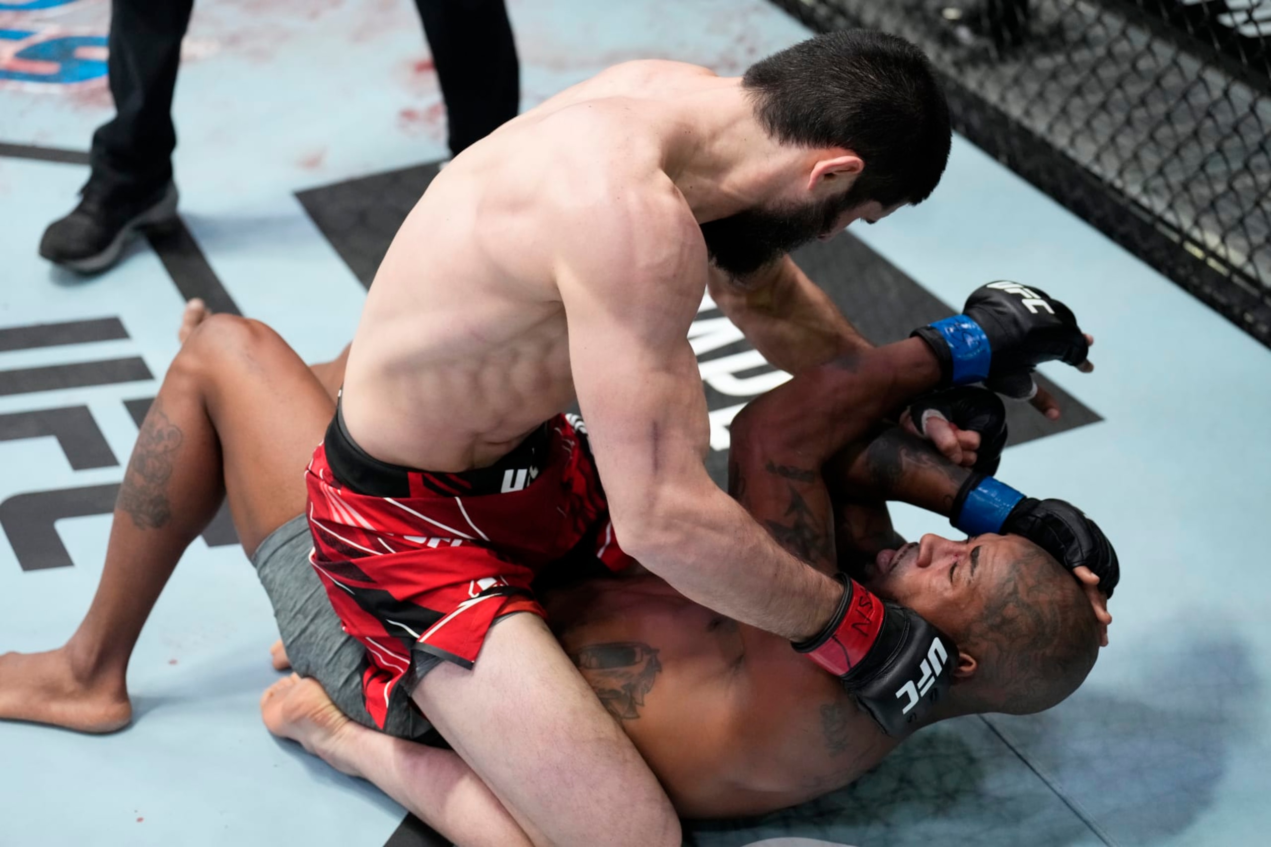 LAS VEGAS, NEVADA - FEBRUARY 26: (L-R) Islam Makhachev of Russia punches Bobby Green in their lightweight fight during the UFC Fight Night event at UFC APEX on February 26, 2022 in Las Vegas, Nevada. (Photo by Chris Unger/Zuffa LLC)