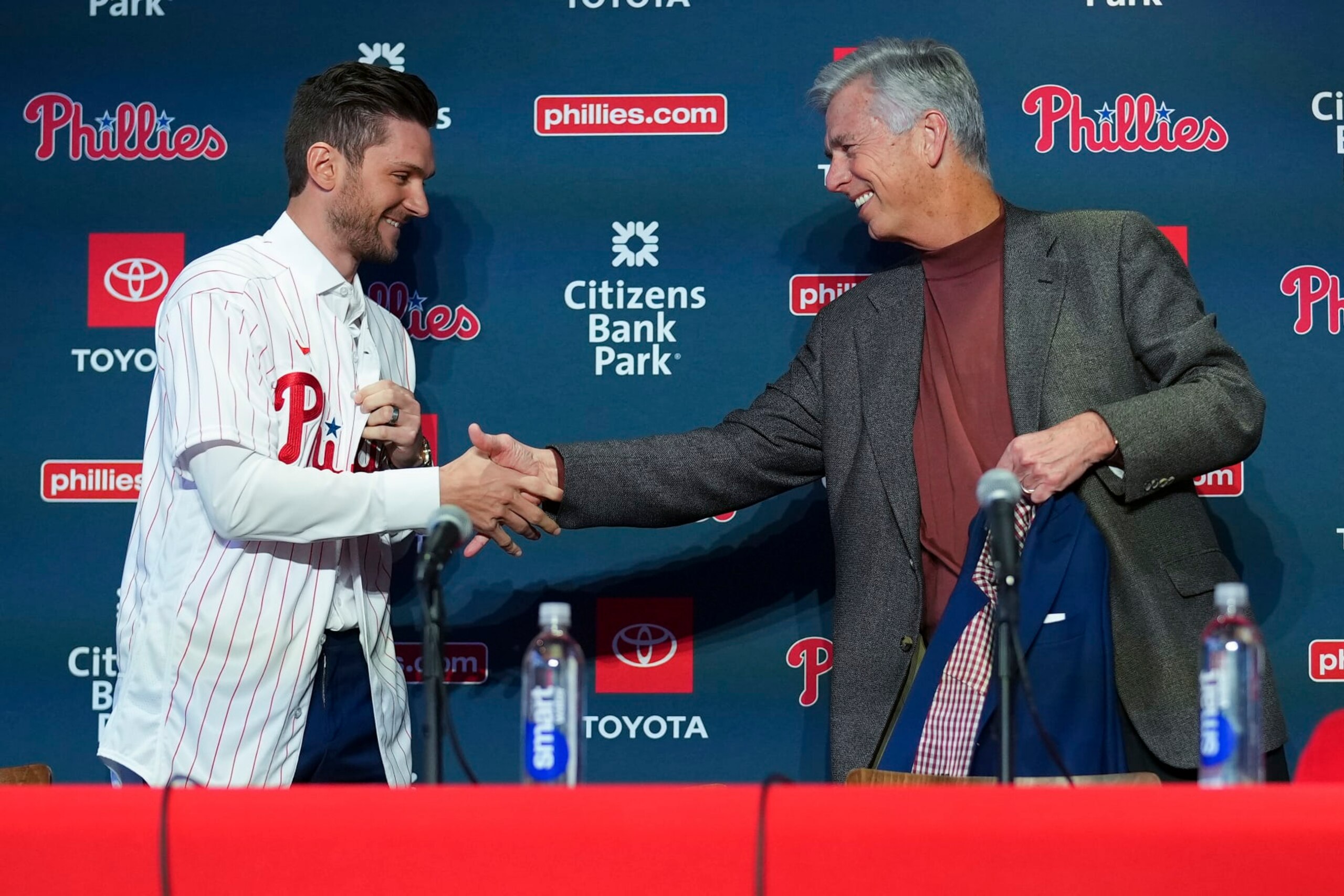 PHILADELPHIA, PA - DECEMBER 08: Trea Turner # 7 of the Philadelphia Phillies shakes hands with president of baseball operations Dave Dombrowski during his introductory press conference at Citizens Bank Park on December 8, 2022 in Philadelphia, Pennsylvania. (Photo by Mitchell Leff/Getty Images)