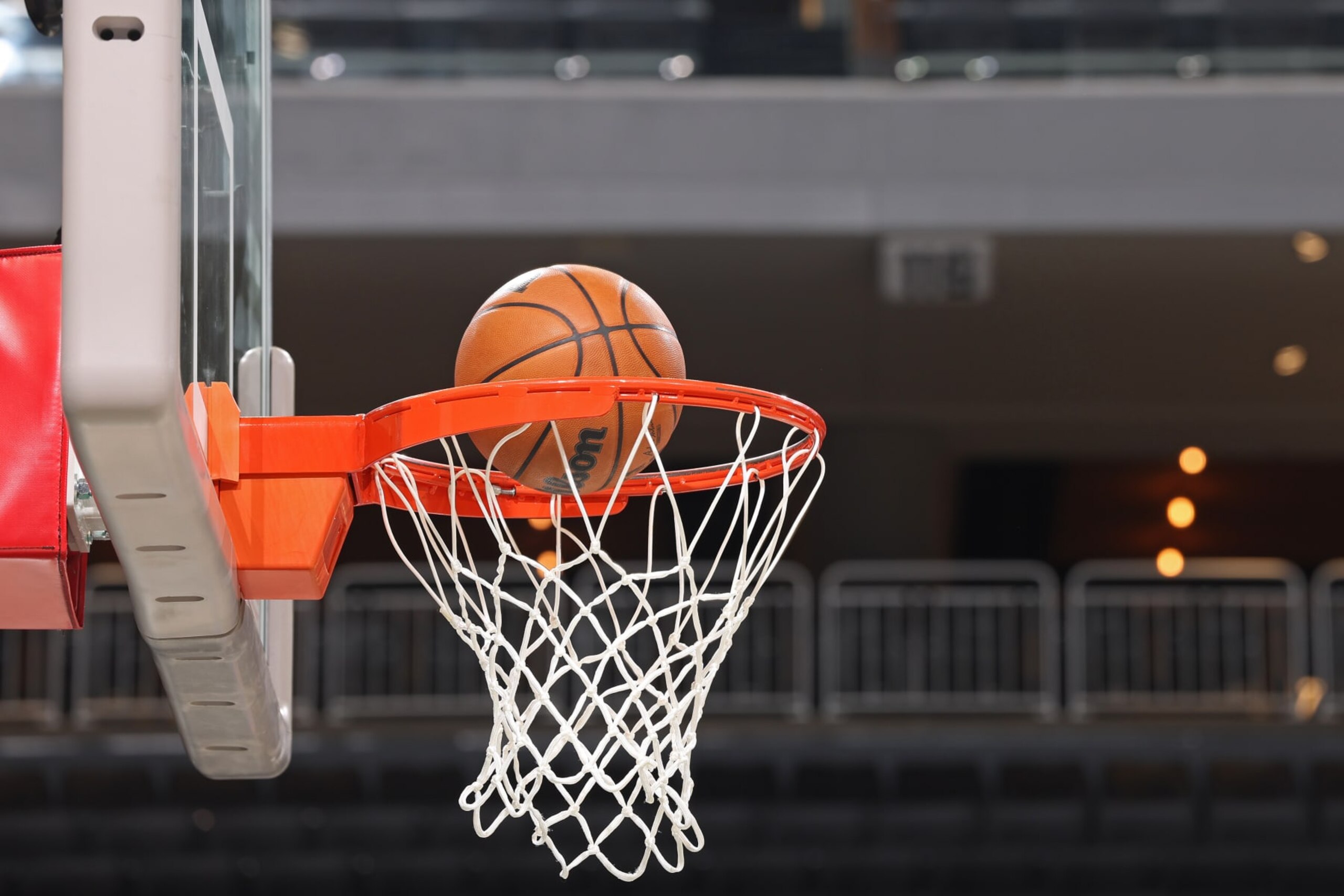 MILWAUKEE, WI - NOVEMBER 27: A generic basketball photo of the Official Wilson basketball going through the net during the Dallas Mavericks game against the Milwaukee Bucks on November 27, 2022 at the Fiserv Forum Center in Milwaukee, Wisconsin. NOTE TO USER: User expressly acknowledges and agrees that, by downloading and or using this Photograph, user is consenting to the terms and conditions of the Getty Images License Agreement. Mandatory Copyright Notice: Copyright 2022 NBAE (Photo by Jeff Haynes/NBAE via Getty Images).