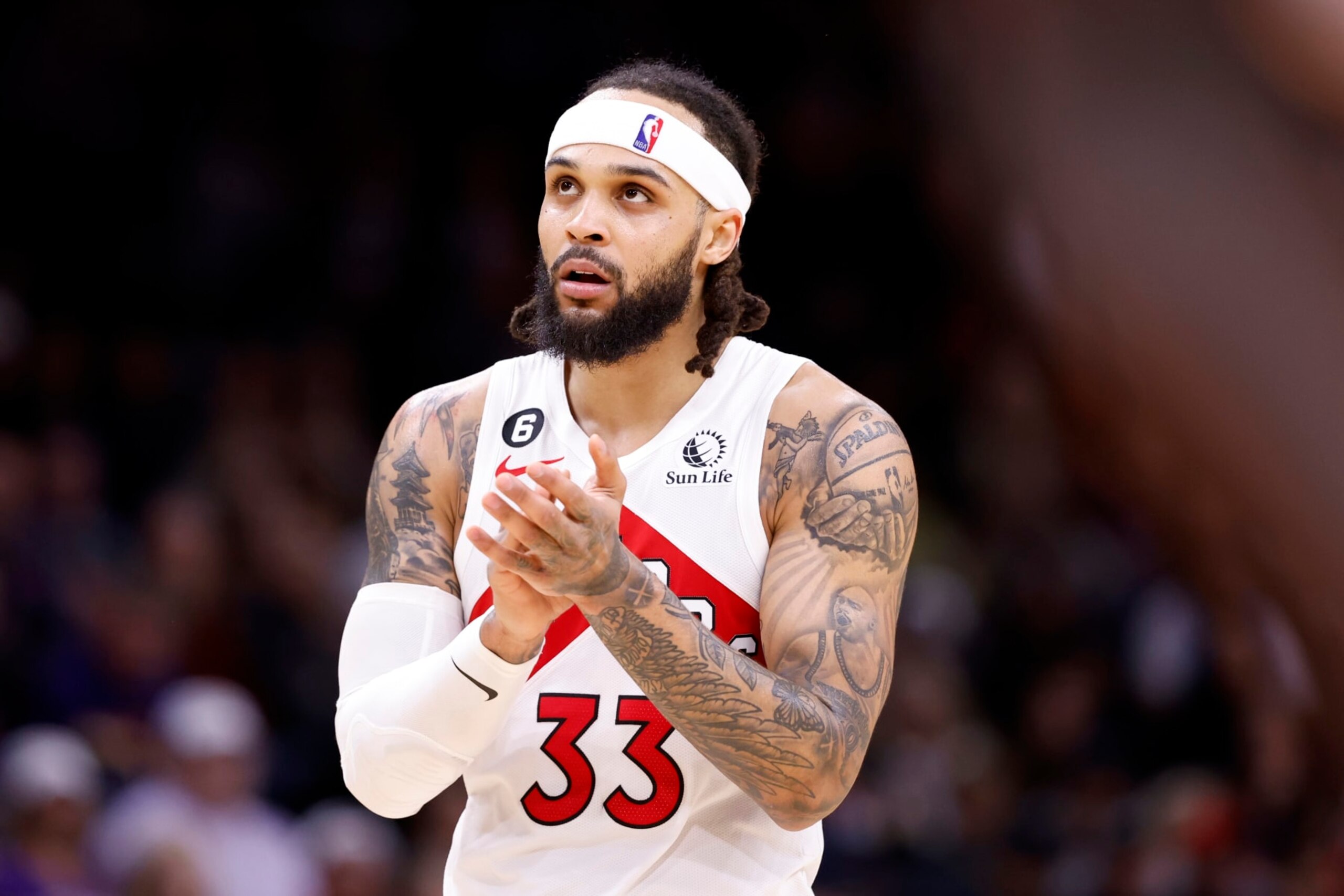 PHOENIX, ARIZONA - JANUARY 30: Gary Trent Jr. #33 of the Toronto Raptors claps during the game against the Phoenix Suns at Footprint Center on January 30, 2023 in Phoenix, Arizona. The Suns beat the Raptors 114-106. NOTE TO USER: User expressly acknowledges and agrees that,  by downloading and or using this photograph,  User is consenting to the terms and conditions of the Getty Images License Agreement.  (Photo by Chris Coduto/Getty Images)