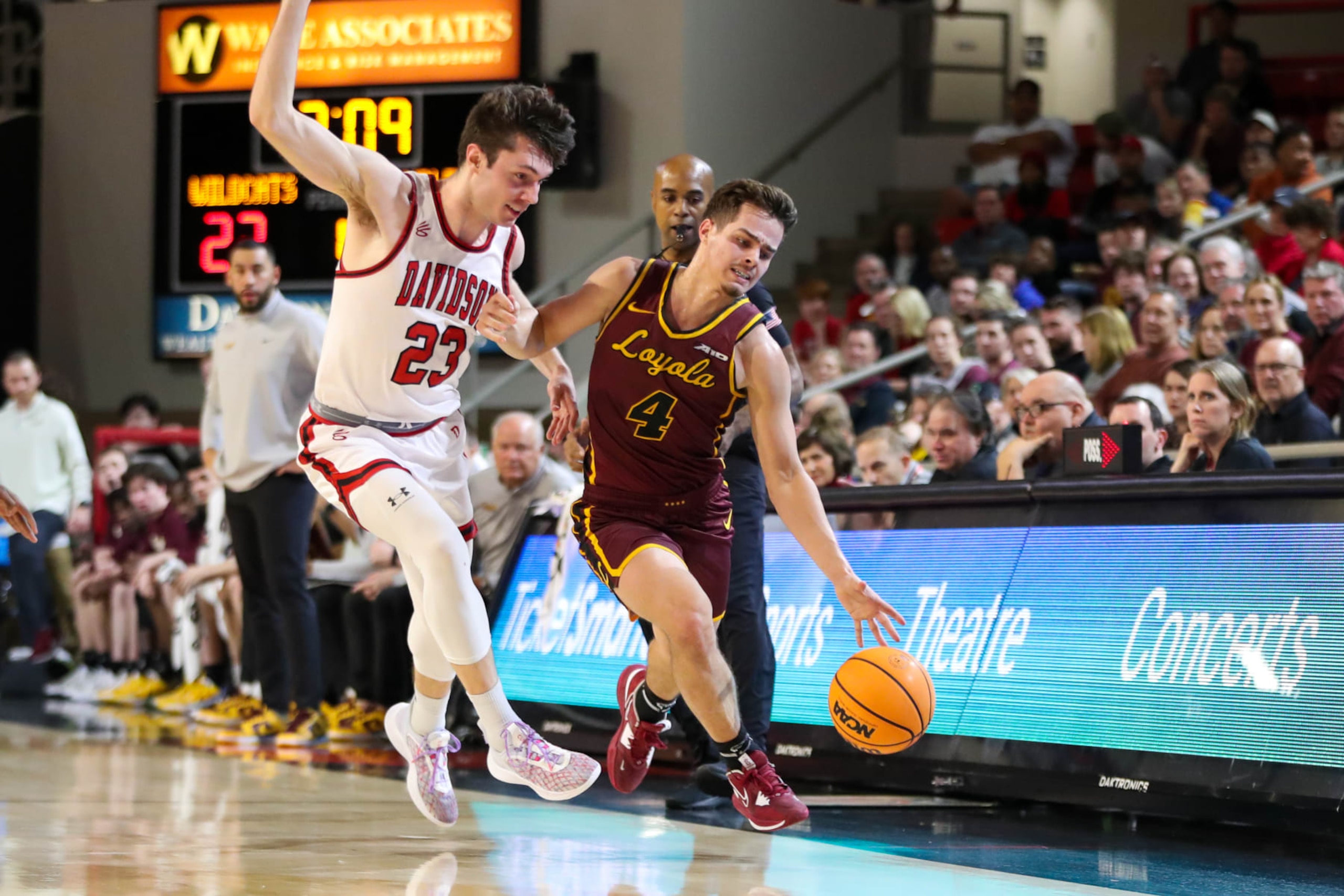 Loyola-Chicago's Braden Norris and Davidson's Connor Kochera