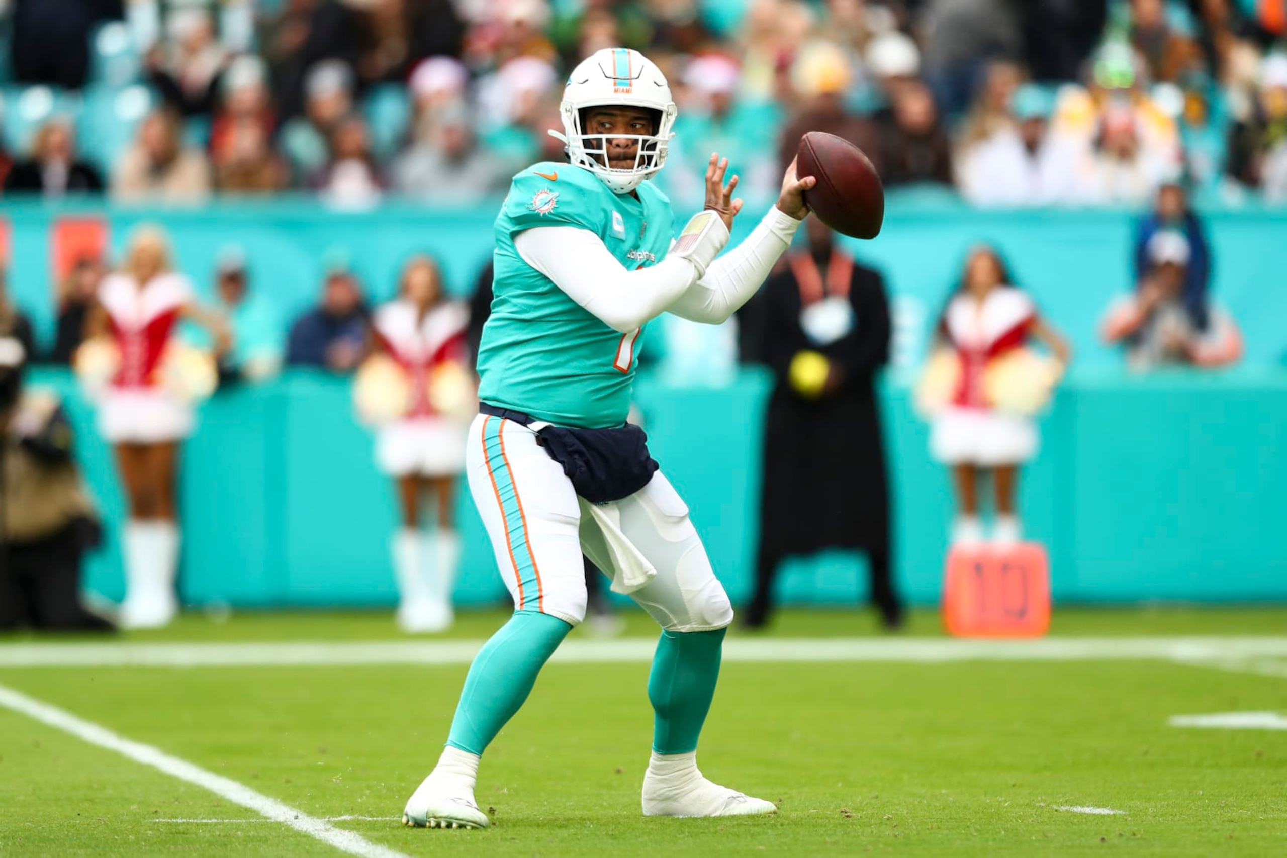 MIAMI GARDENS, FL - DECEMBER 25: Tua Tagovailoa #1 of the Miami Dolphins throws a pass during the first quarter of an NFL football game against the Green Bay Packers at Hard Rock Stadium on December 25, 2022 in Miami Gardens, Florida. (Photo by Kevin Sabitus/Getty Images) MIAMI GARDENS, FL - DECEMBER 25: Tua Tagovailoa #1 of the Miami Dolphins throws a pass during the first quarter of an NFL football game against the Green Bay Packers at Hard Rock Stadium on December 25, 2022 in Miami Gardens, Florida. (Photo by Kevin Sabitus/Getty Images)