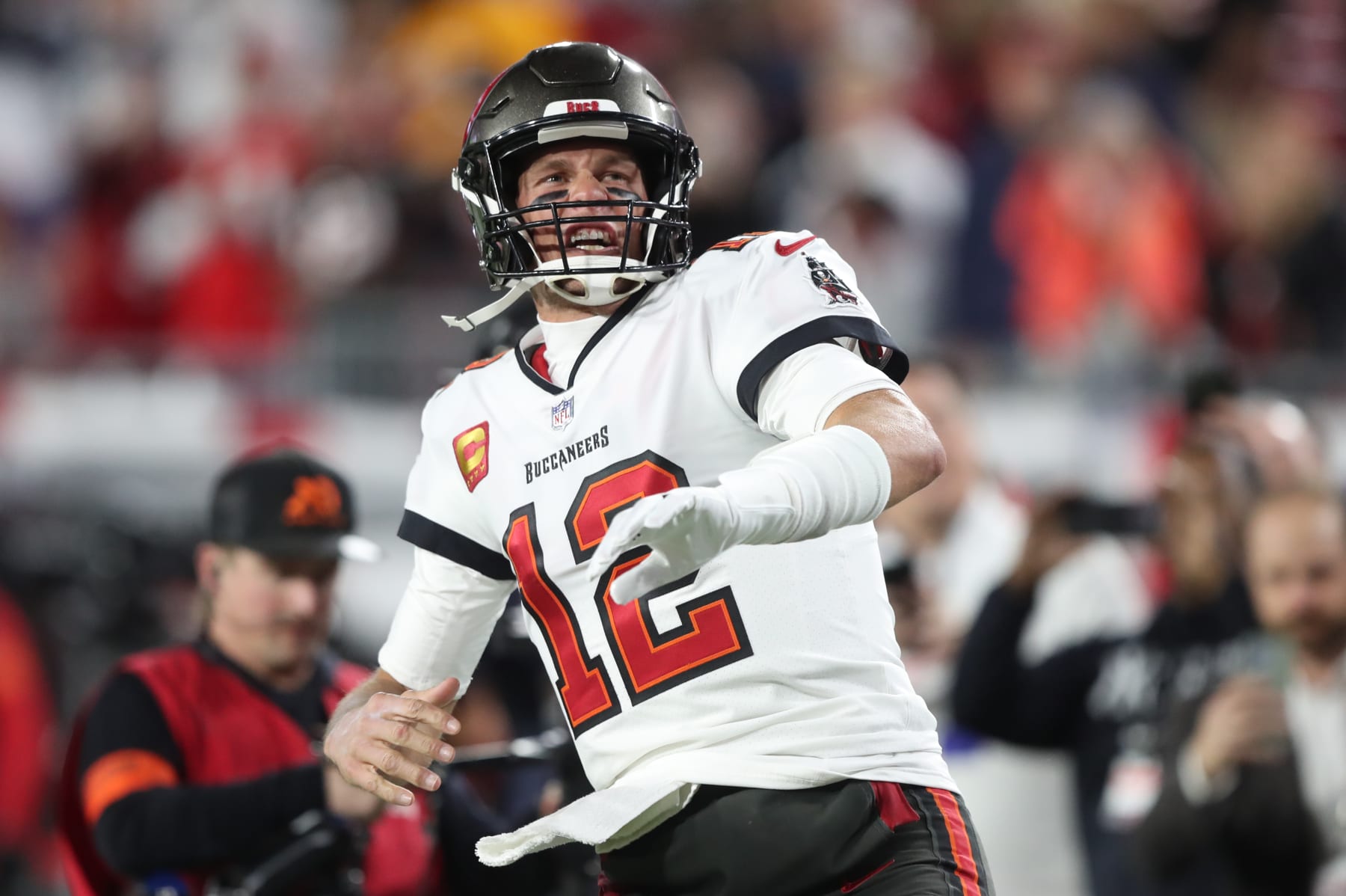 TAMPA, FL - JANUARY 16: Tampa Bay Buccaneers quarterback Tom Brady (12) yells to the crowd before the NFC Wild Card Playoff game between the Dallas Cowboys and the Tampa Bay Buccaneers on January 16, 2023 at Raymond James Stadium in Tampa, Florida. (Photo by Cliff Welch/Icon Sportswire via Getty Images)