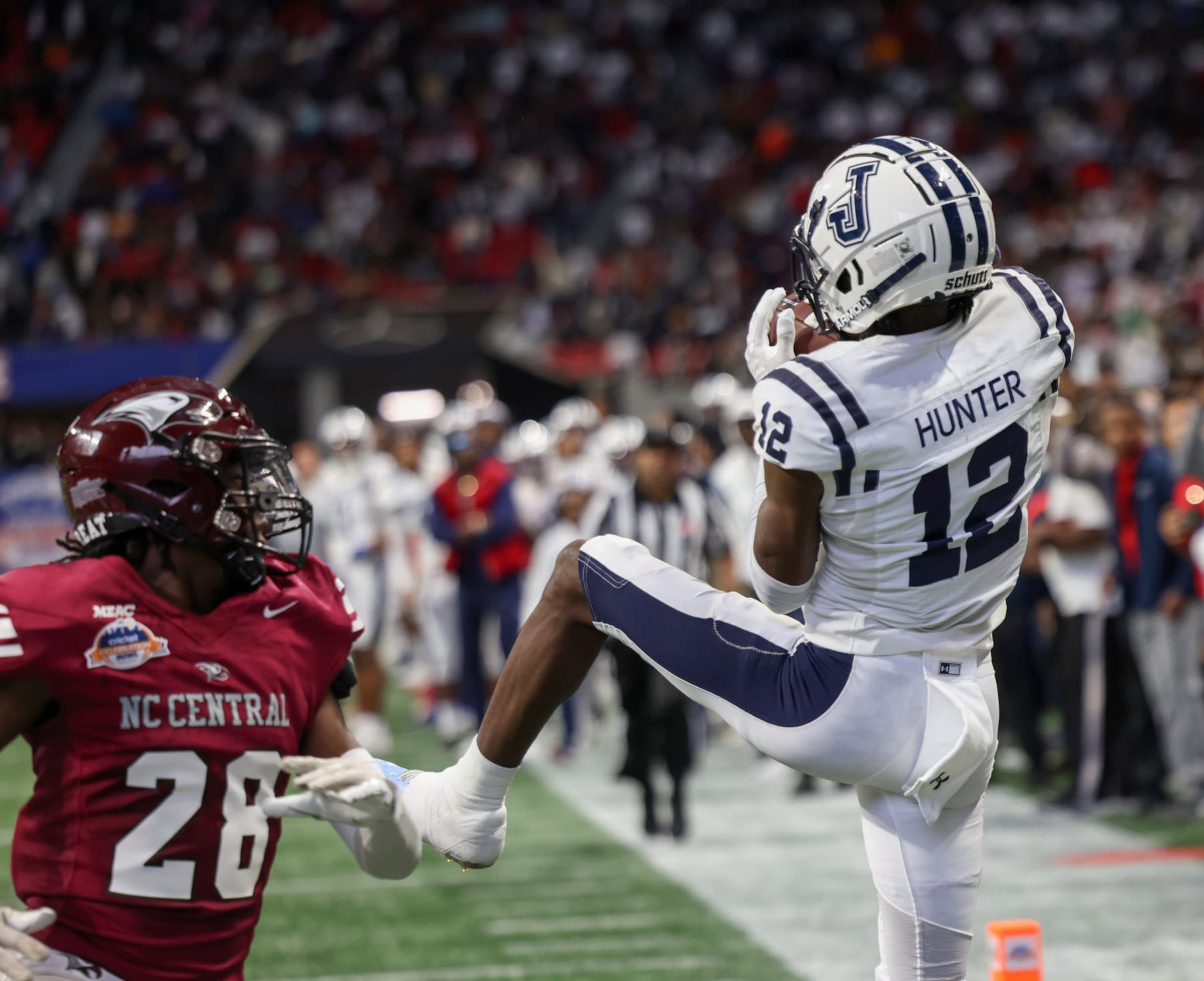 ATLANTA, GA - DECEMBER 17: JSU Receiver Travis Hunter catches the touchdown that tied the game with no time on the clock to send the game into overtime during the Jackson State Tigers and North Carolina Central Eagles Celebration Bowl Football Championship game at Mercedes Benz Stadium on December 17, 2022, in Atlanta, GA (Photo by Charles A. Smith/Jackson State University via Getty Images)