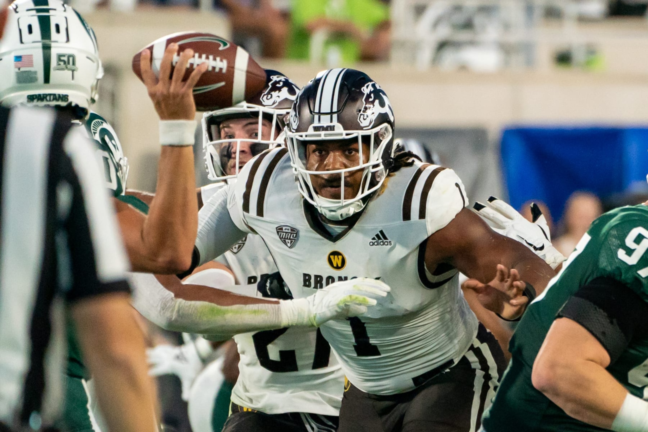 EAST LANSING, MI - SEPTEMBER 02:  Andre Carter #1 of Western Michigan keeps his eye on the ball against Michigan State at Spartan Stadium in East Lansing, Michigan on September 2, 2022.  (Photo by Jaime Crawford/Getty Images)