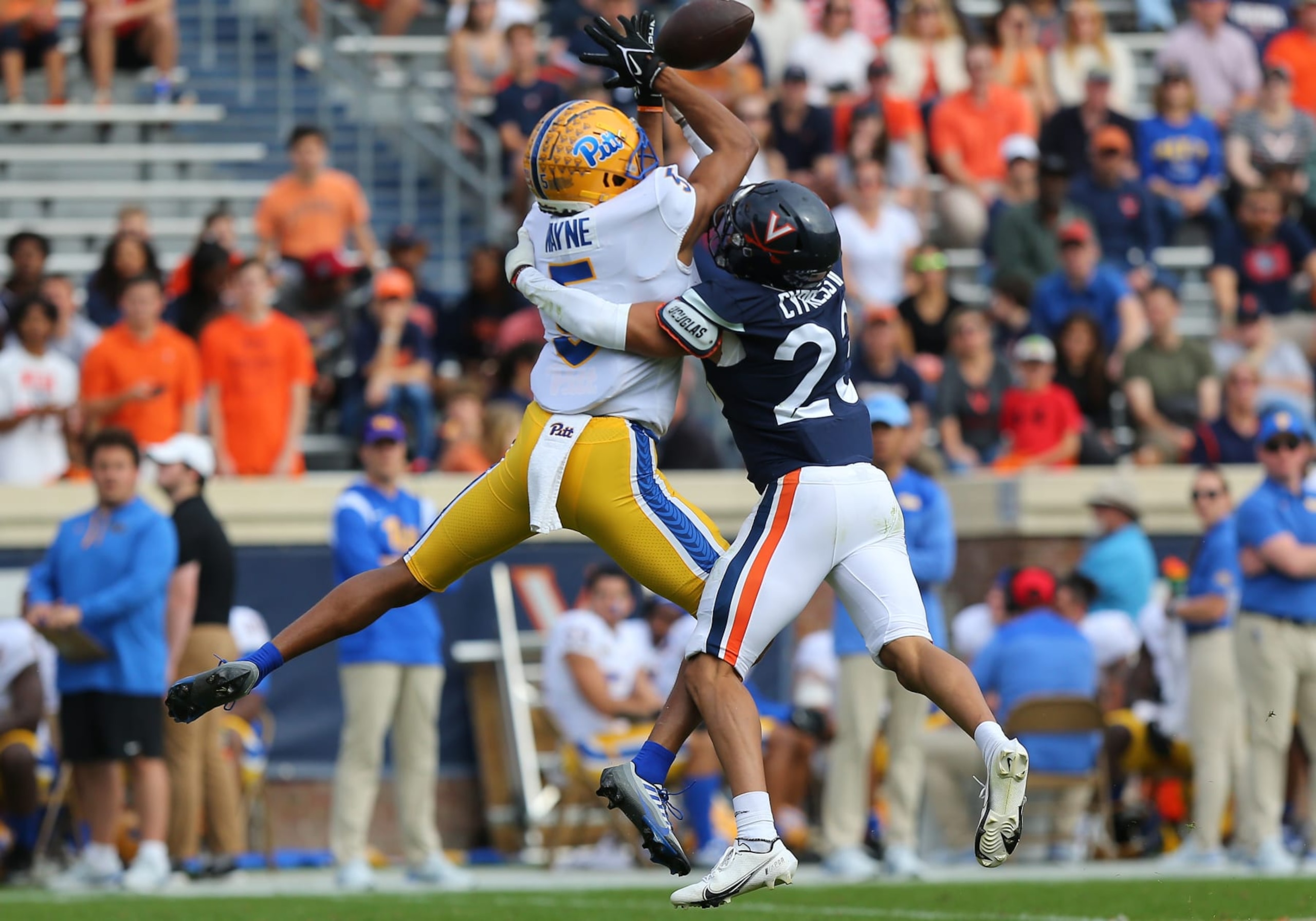 CHARLOTTESVILLE, VA - NOVEMBER 12: Virginia Cavaliers defensive back Fentrell Cypress II (23) attempts to defend Pittsburgh Panthers wide receiver Jared Wayne (5) during a college football game between the Pittsburgh Panthers and the Virginia Cavaliers on November 12, 2022, at Scott Stadium in Charlottesville, VA. (Photo by Lee Coleman/Icon Sportswire via Getty Images)