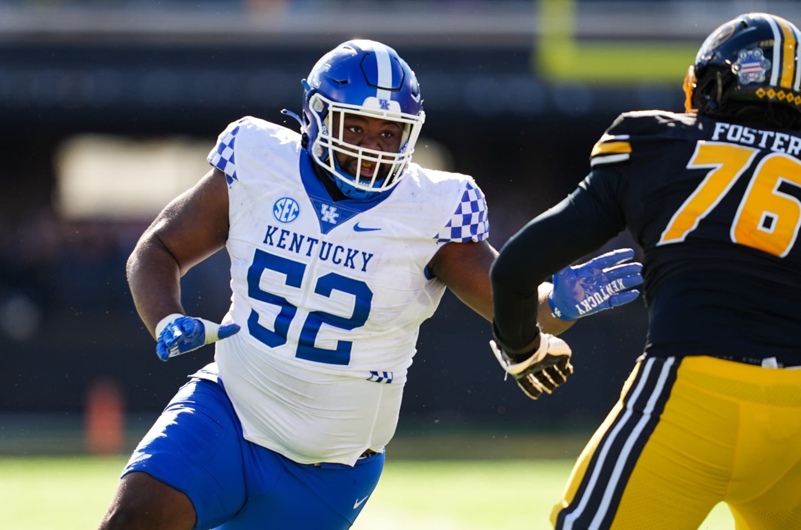 COLUMBIA, MO - NOVEMBER 05: Justin Rogers #52 of the Kentucky Wildcats rushes the passer against Javon Foster during the second half at Faurot Field/Memorial Stadium on November 5, 2022 in Columbia, Missouri. (Photo by Jay Biggerstaff/Getty Images)