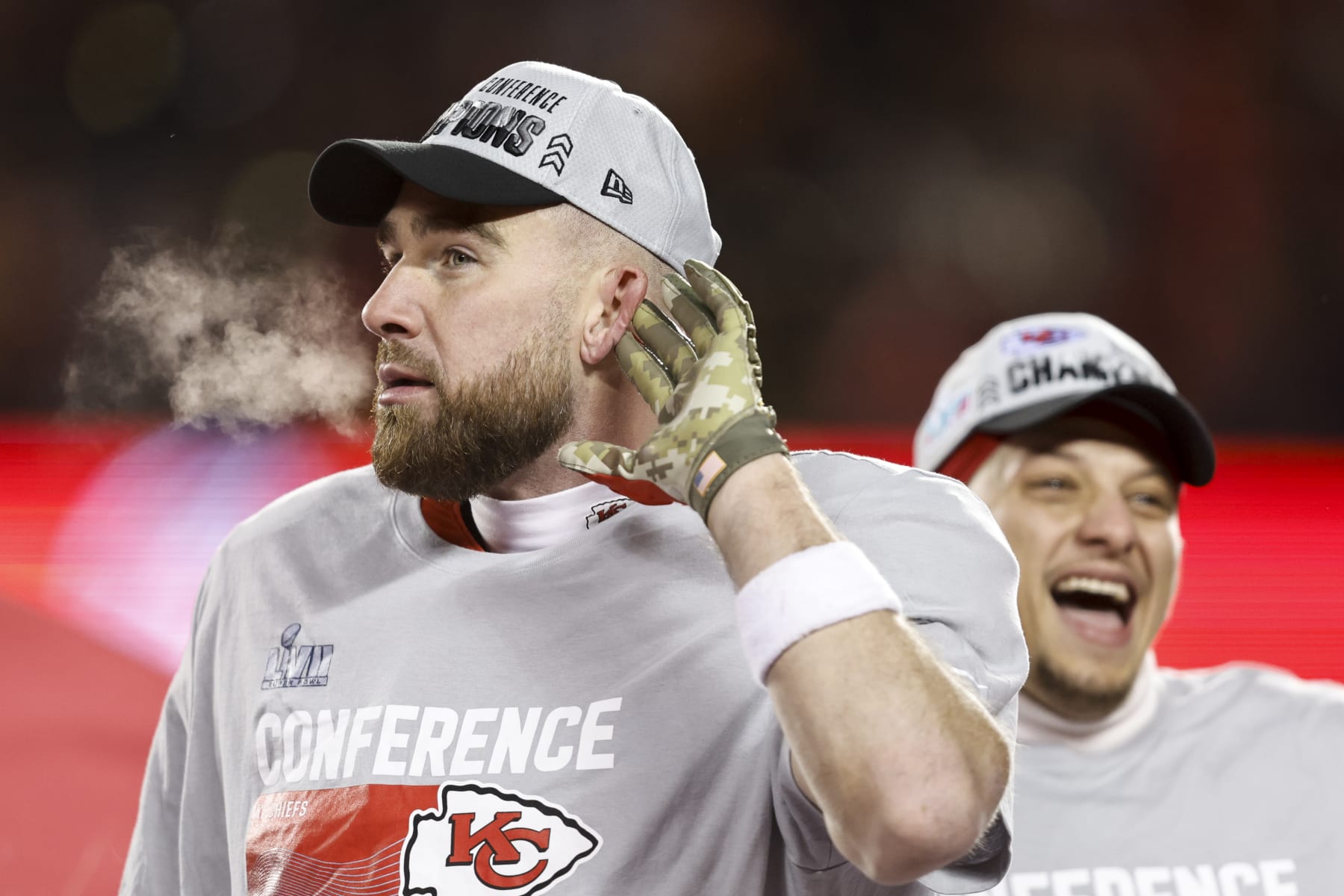 KANSAS CITY, MISSOURI - JANUARY 29: Travis Kelce #87 of the Kansas City Chiefs and Patrick Mahomes #15 of the Kansas City Chiefs celebrate with the Lamar Hunt Trophy after winning the AFC Championship NFL football game between the Kansas City Chiefs and the Cincinnati Bengals at GEHA Field at Arrowhead Stadium on January 29, 2023 in Kansas City, Missouri. (Photo by Michael Owens/Getty Images)