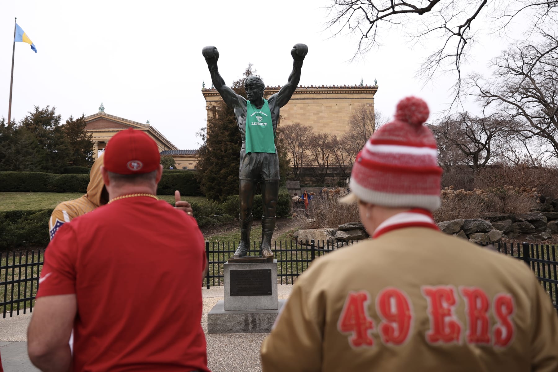 PHILADELPHIA, PENNSYLVANIA - JANUARY 28: Visitors pose with the Rocky statue outside the Philadelphia Museum of Art on January 28, 2023 in Philadelphia, Pennsylvania. (Photo by Tim Nwachukwu/Getty Images)