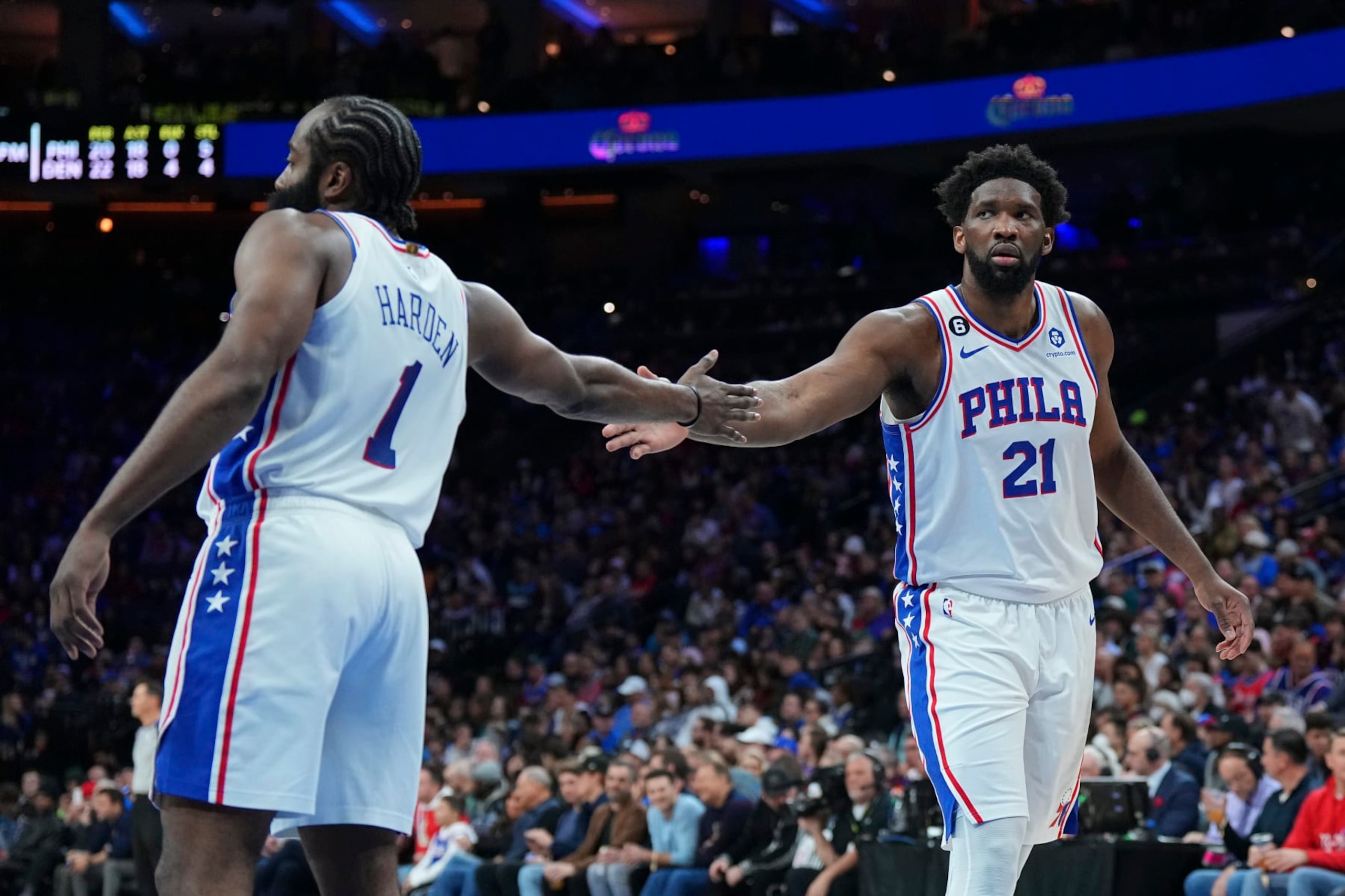 PHILADELPHIA, PA - JANUARY 28: James Harden #1 of the Philadelphia 76ers celebrates with Joel Embiid #21 against the Denver Nuggets at the Wells Fargo Center on January 28, 2023 in Philadelphia, Pennsylvania. NOTE TO USER: User expressly acknowledges and agrees that, by downloading and or using this photograph, User is consenting to the terms and conditions of the Getty Images License Agreement. (Photo by Mitchell Leff/Getty Images)