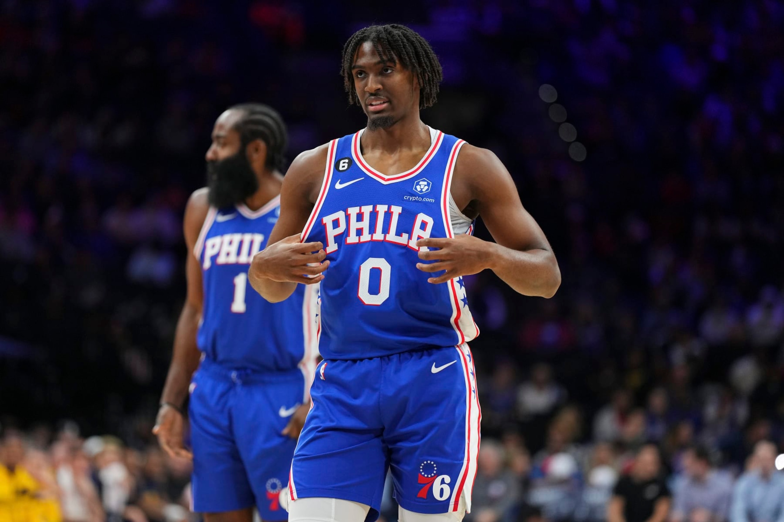 PHILADELPHIA, PA - JANUARY 04: Tyrese Maxey #0 and James Harden #1 of the Philadelphia 76ers look on against the Indiana Pacers at the Wells Fargo Center on January 4, 2023 in Philadelphia, Pennsylvania. NOTE TO USER: User expressly acknowledges and agrees that, by downloading and or using this photograph, User is consenting to the terms and conditions of the Getty Images License Agreement. (Photo by Mitchell Leff/Getty Images)