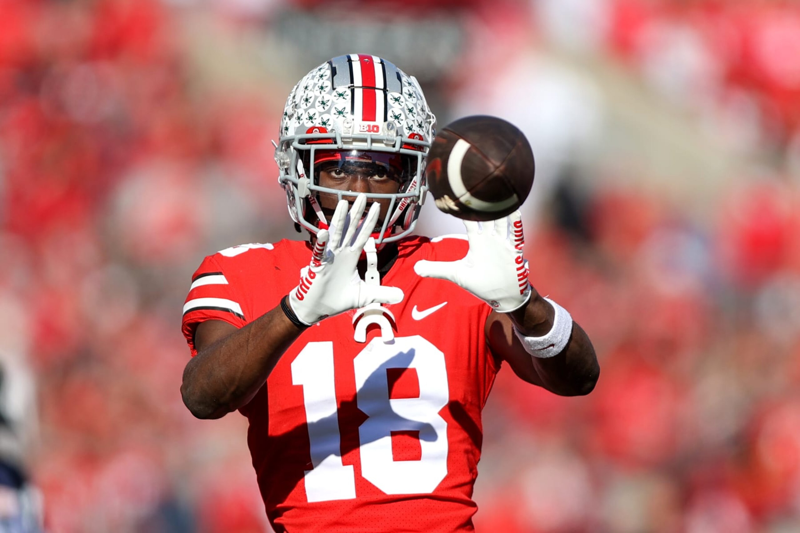 COLUMBUS, OH - NOVEMBER 26: Ohio State Buckeyes wide receiver Marvin Harrison Jr. (18) catches the football on the sideline during the second quarter of the college football game between the Michigan Wolverines and Ohio State Buckeyes on November 26, 2022, at Ohio Stadium in Columbus, OH. (Photo by Frank Jansky/Icon Sportswire via Getty Images)
