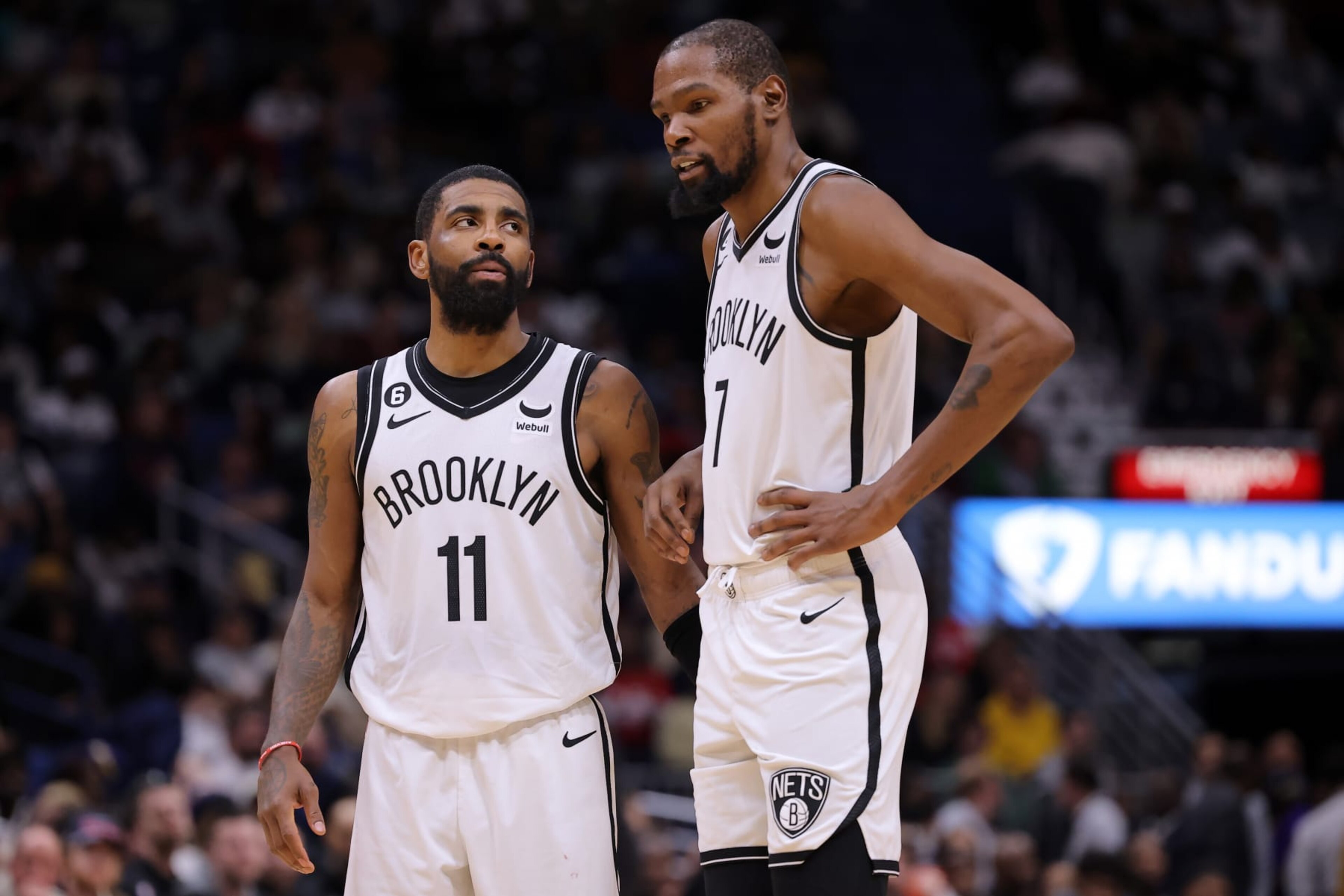 NEW ORLEANS, LOUISIANA - JANUARY 06: Kevin Durant #7 and Kyrie Irving #11 of the Brooklyn Nets react during a game against the New Orleans Pelicans at the Smoothie King Center on January 06, 2023 in New Orleans, Louisiana. NOTE TO USER: User expressly acknowledges and agrees that, by downloading and or using this Photograph, user is consenting to the terms and conditions of the Getty Images License Agreement. (Photo by Jonathan Bachman/Getty Images) NEW ORLEANS, LOUISIANA - JANUARY 06: Kevin Durant #7 and Kyrie Irving #11 of the Brooklyn Nets react during a game against the New Orleans Pelicans at the Smoothie King Center on January 06, 2023 in New Orleans, Louisiana. NOTE TO USER: User expressly acknowledges and agrees that, by downloading and or using this Photograph, user is consenting to the terms and conditions of the Getty Images License Agreement. (Photo by Jonathan Bachman/Getty Images)