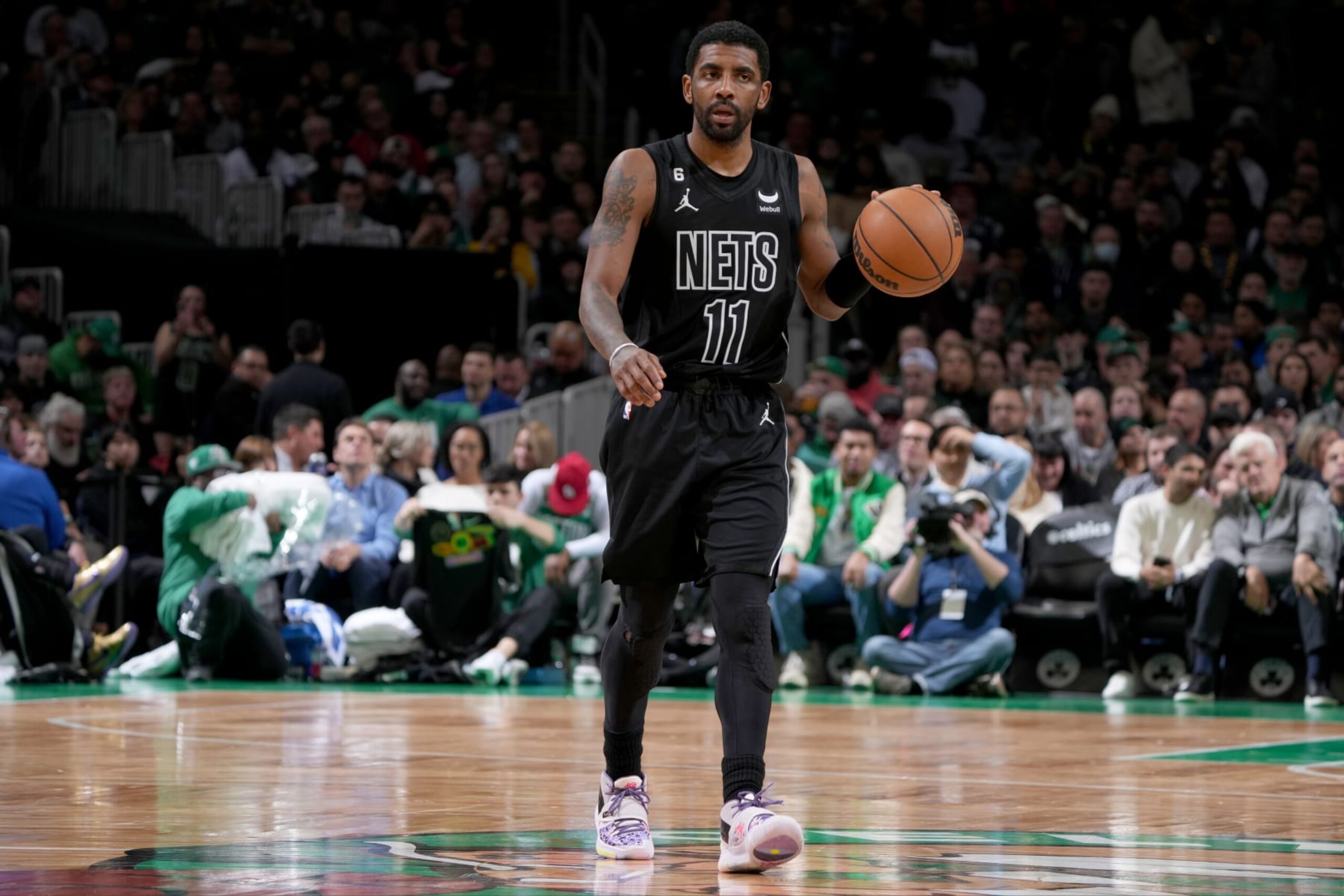 BOSTON, MA - FEBRUARY 1: Kyrie Irving #11 of the Brooklyn Nets moves the ball during the game against the Boston Celtics on February 1, 2023 at the TD Garden in Boston, Massachusetts. NOTE TO USER: User expressly acknowledges and agrees that, by downloading and or using this photograph, User is consenting to the terms and conditions of the Getty Images License Agreement. Mandatory Copyright Notice: Copyright 2023 NBAE  (Photo by Brian Babineau/NBAE via Getty Images)